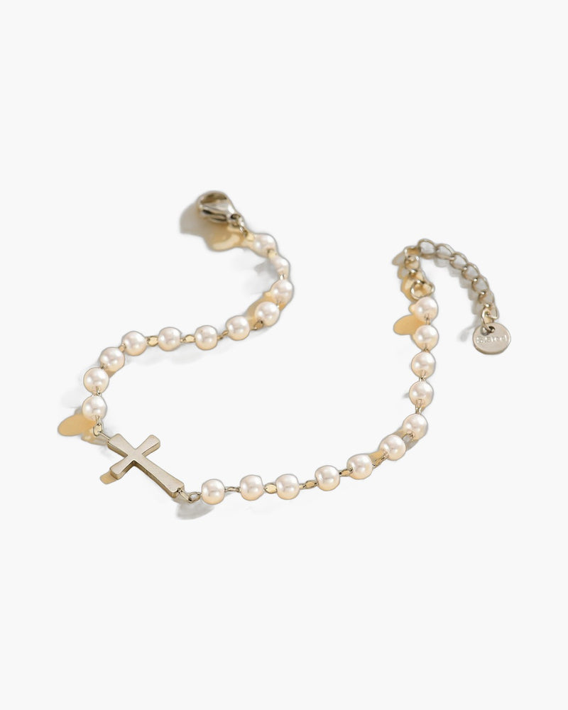 The Serene Strand imitation pearl cross bracelet