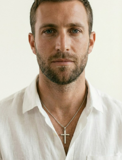 men with a cross necklace