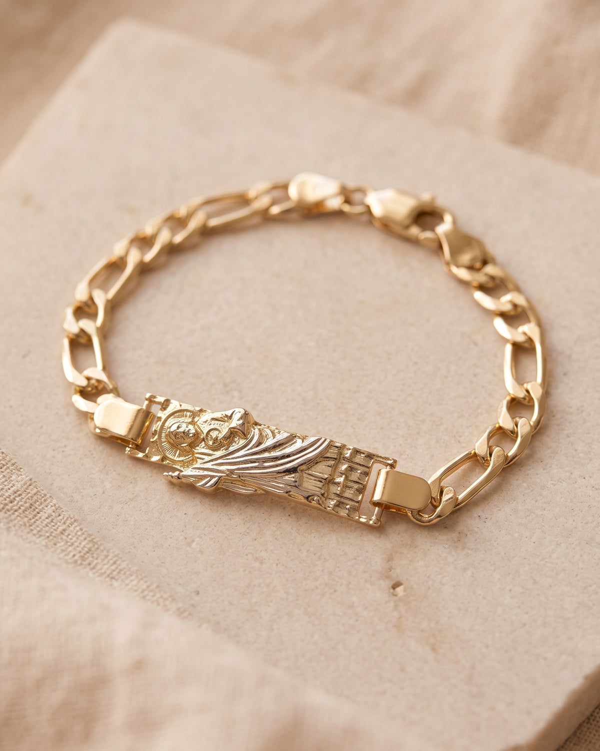 The Saint Jude Bracelet on stone, figaro chain and Saint Jude plate [c:gold-robe]