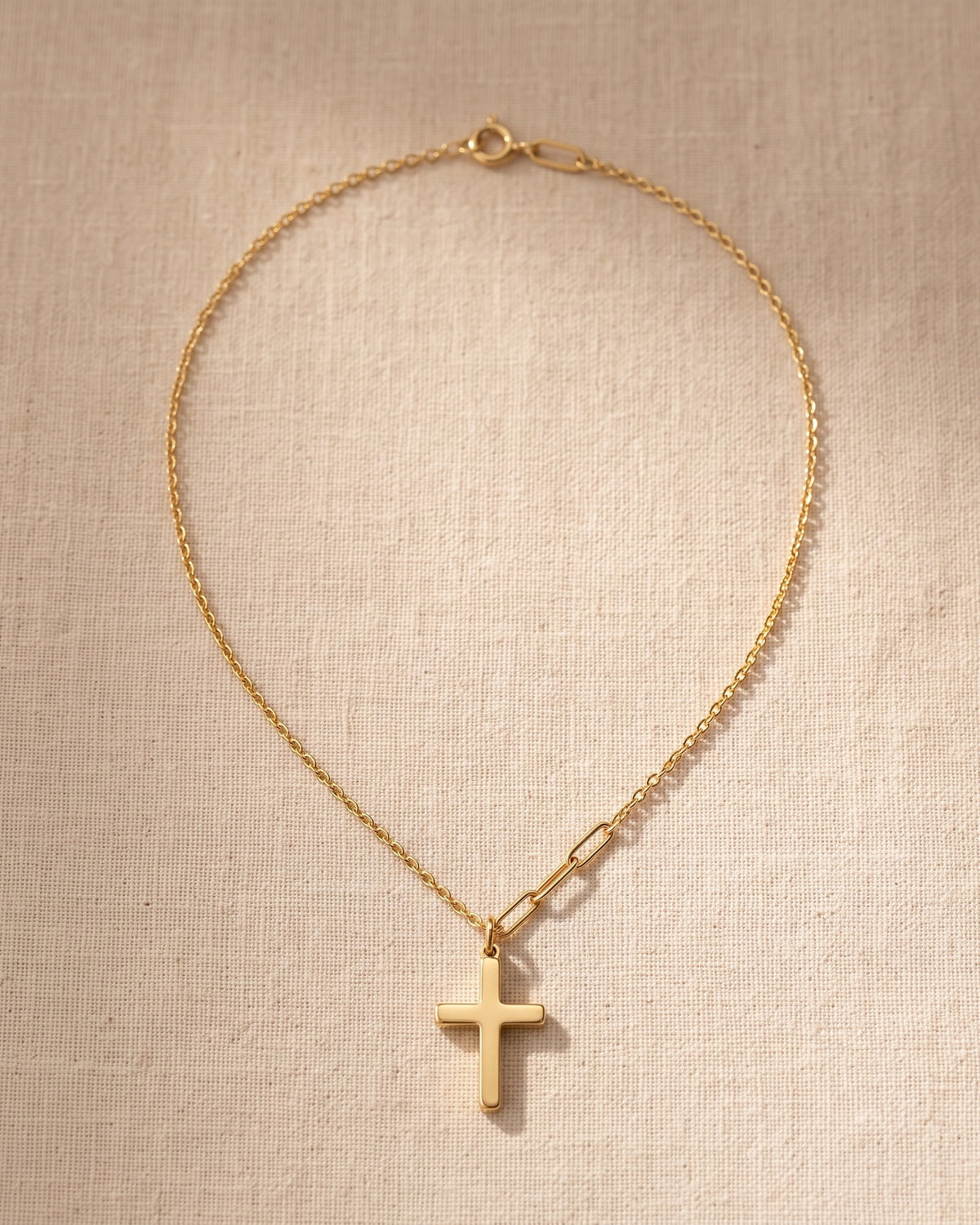 The gold Godchild's Cross necklace laid flat, true to scale [c:gold]