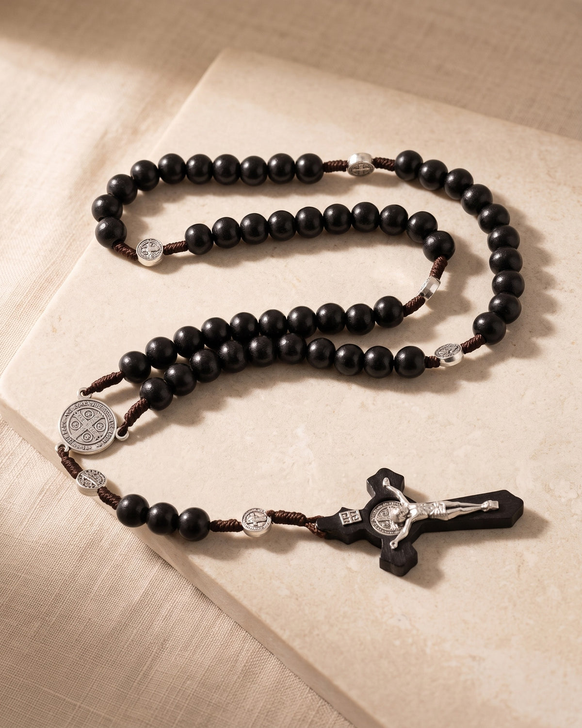 Close-up of The Rosary of Faith crucifix and beads [c:black-beads]