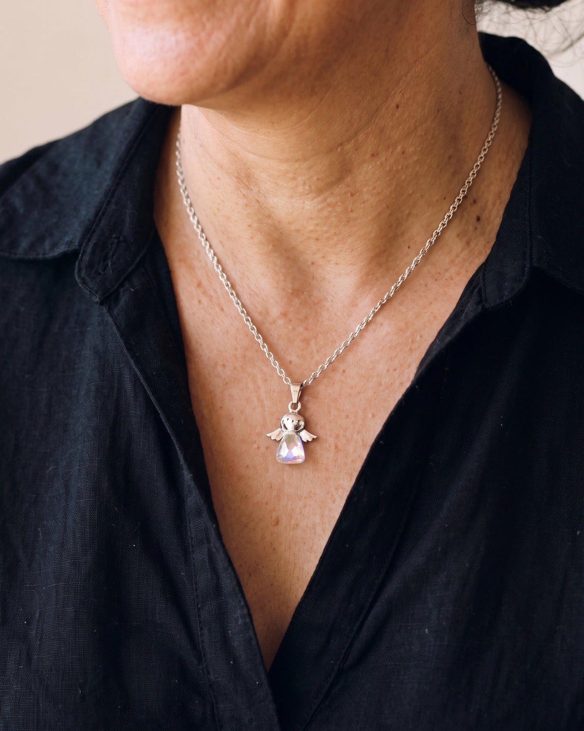 The Crystal Guardian worn on the chest, close-up, true to size