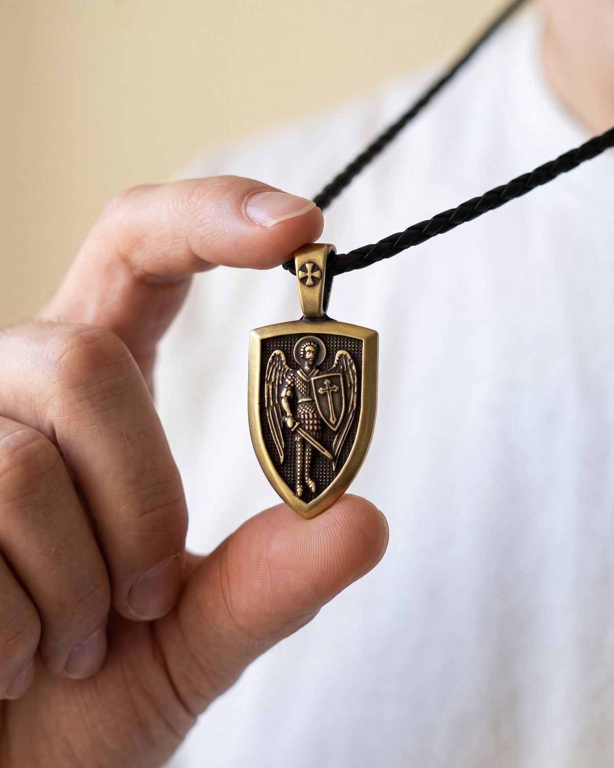 The Archangel Michael Shield held in the hand, true to size [c:bronze]