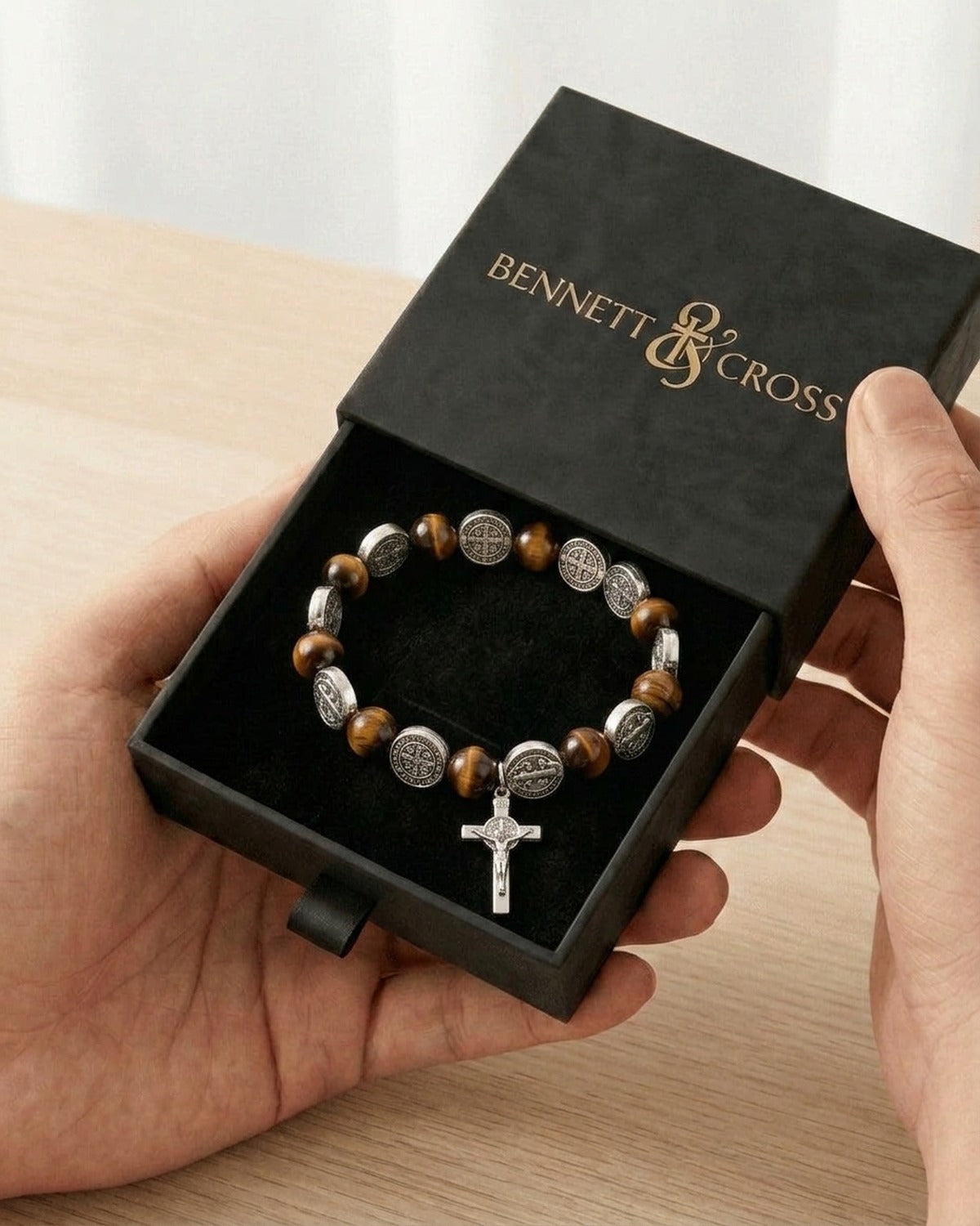 The Benedict Tiger's Eye in its black Bennett & Cross gift box