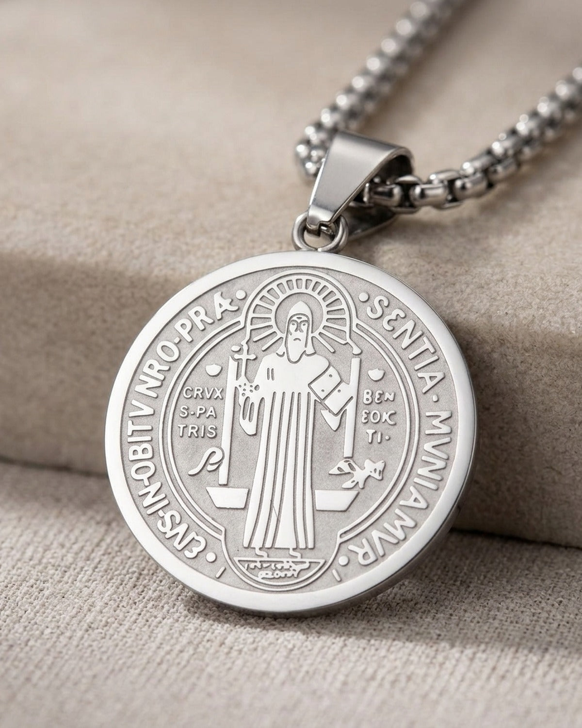 Close-up of the silver Benedictine Medal