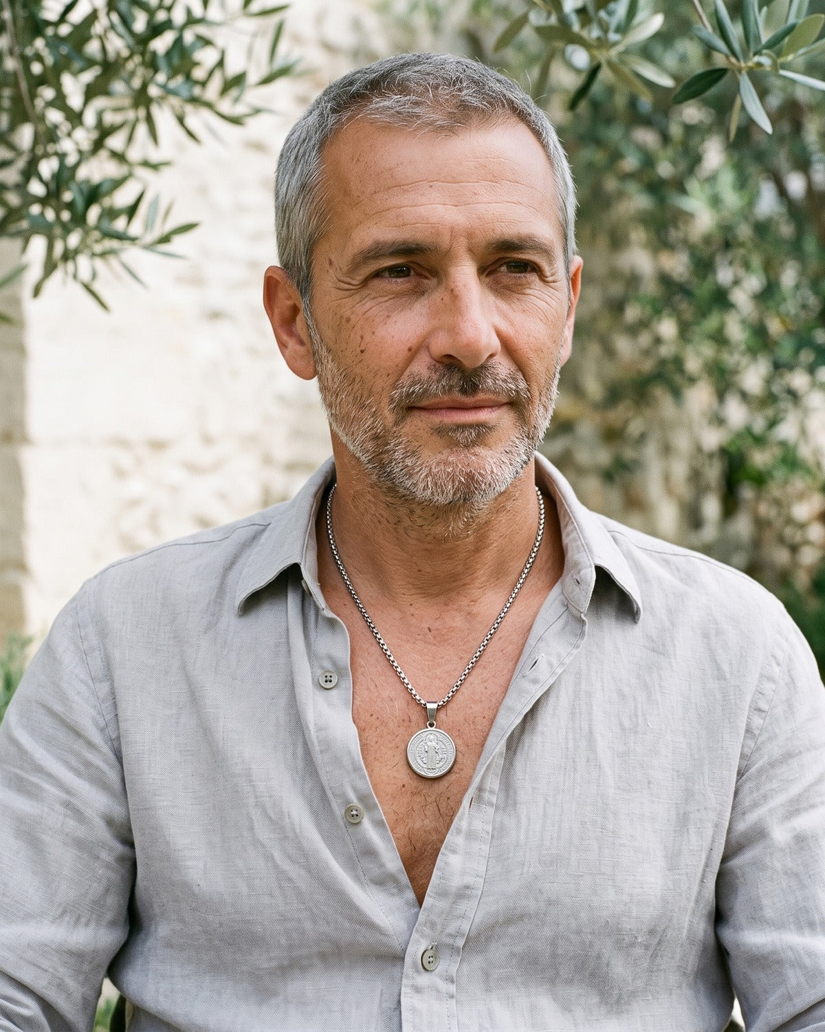Man wearing the silver Benedictine Medal