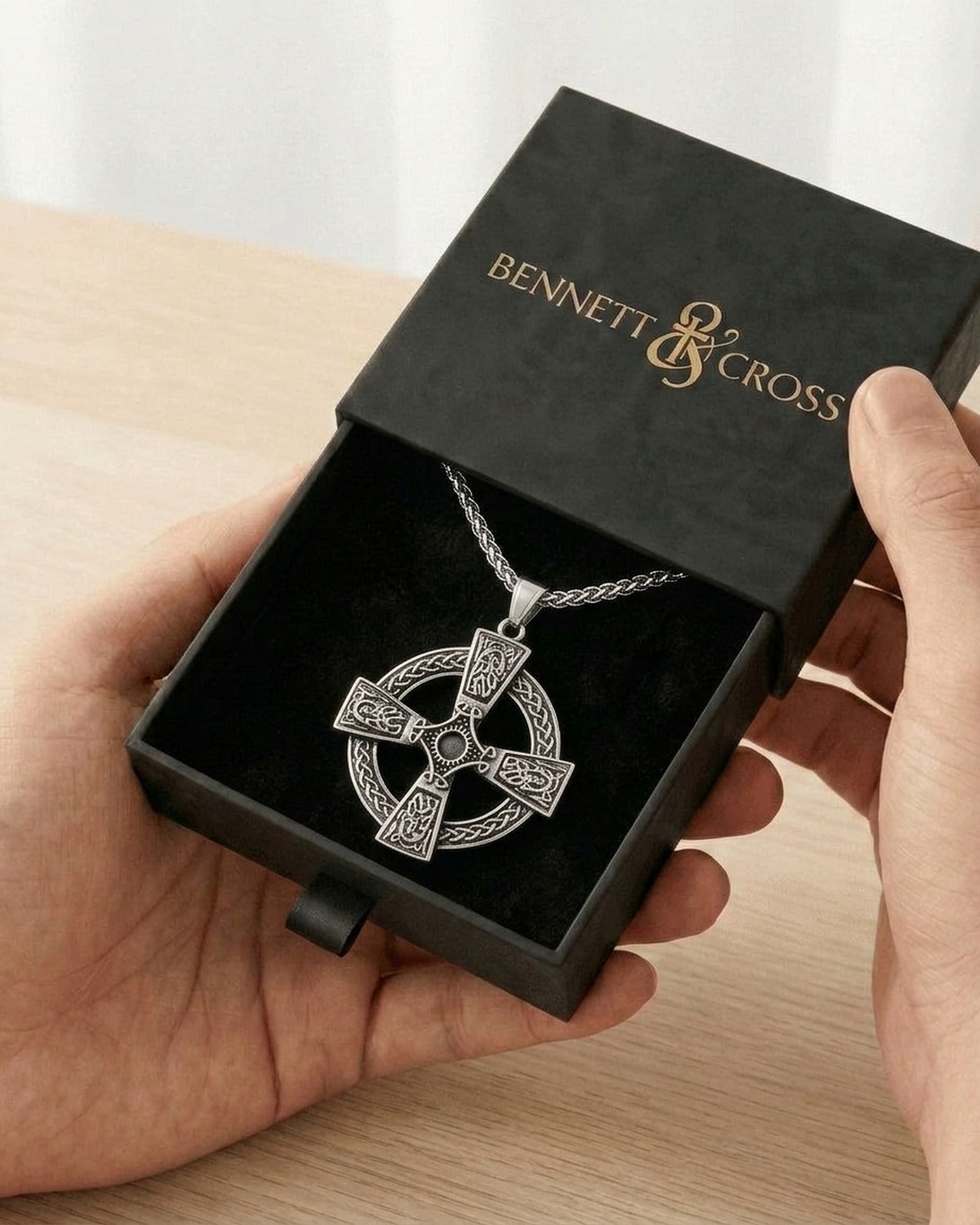 The Boundless Knot in its black Bennett & Cross gift box