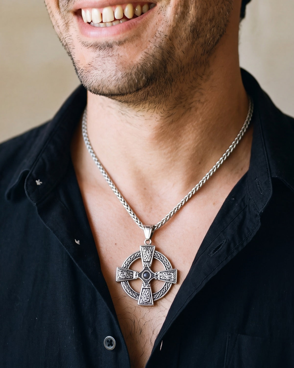 The Boundless Knot worn by a man, close-up, true to size [c:antique-silver]