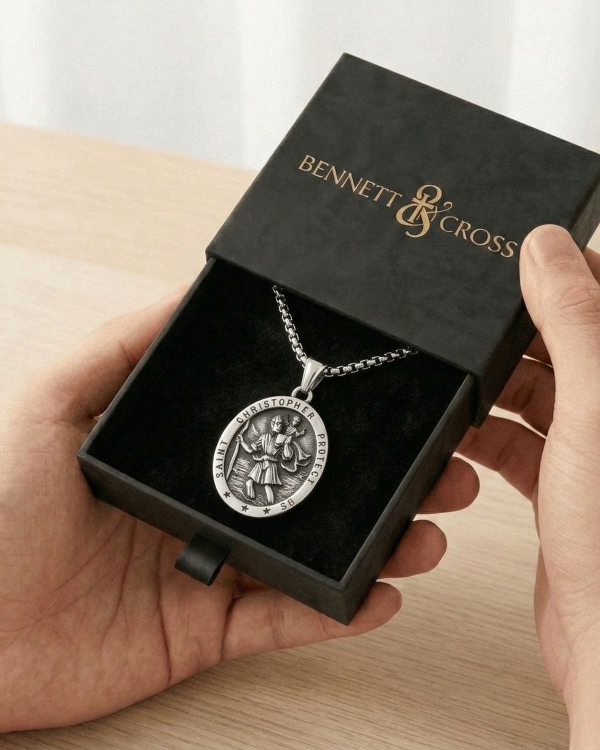 The Christopher Crossing in its Bennett & Cross gift box