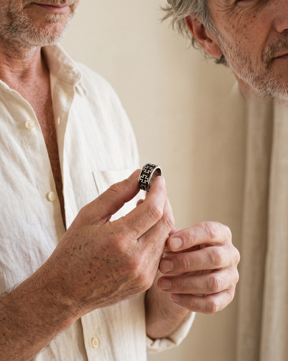 Man holding The Crusader Band between the fingers