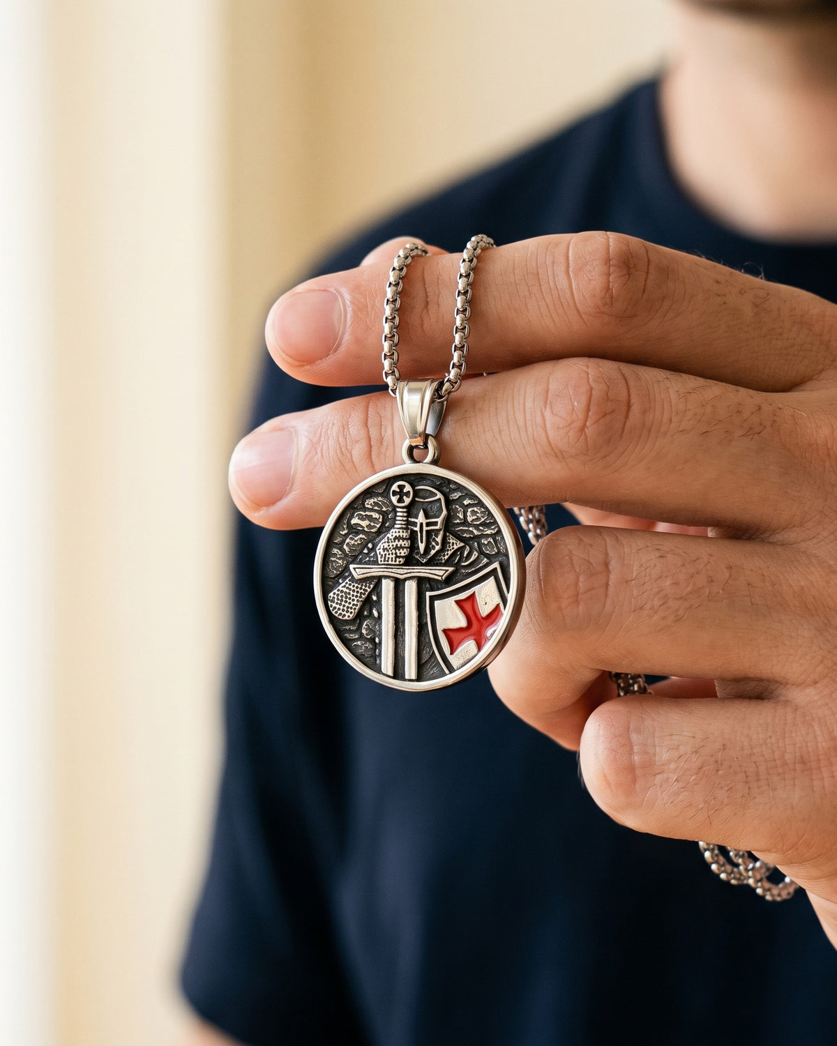 The Crusader's Vow held in the hand, true to size