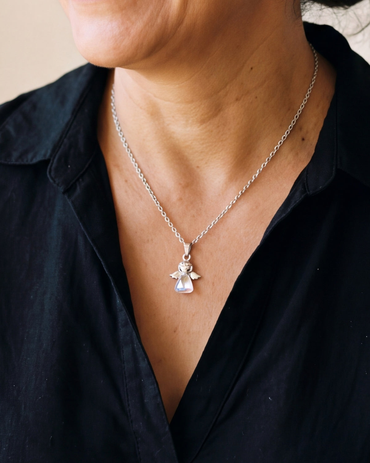 The Crystal Guardian worn on the chest, close-up, true to size