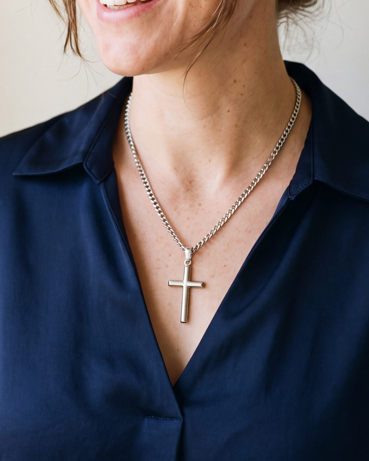 The Devotional Cross worn on the chest, close-up, true to size [c:silver]