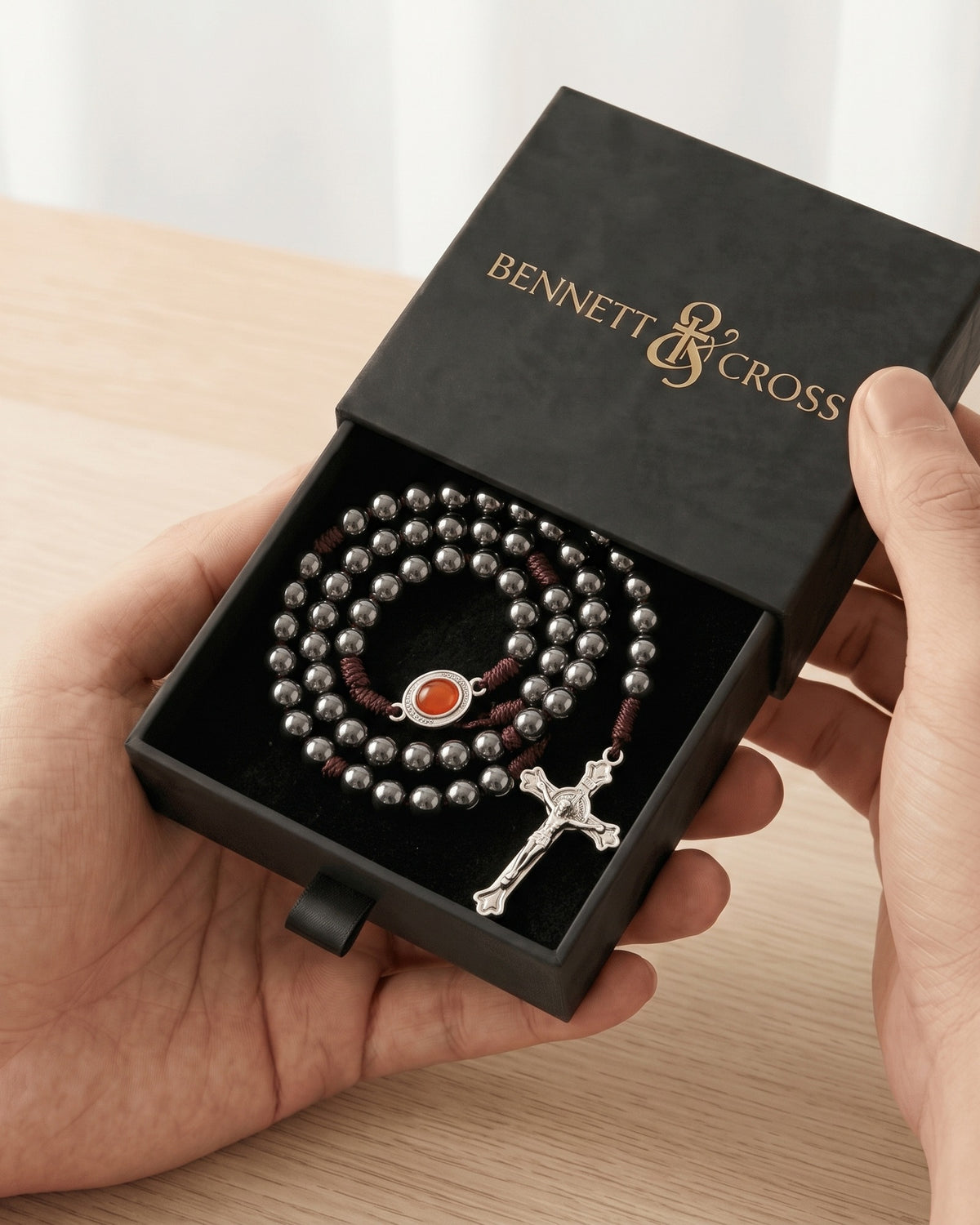 The Devout Rosary in its black Bennett & Cross gift box