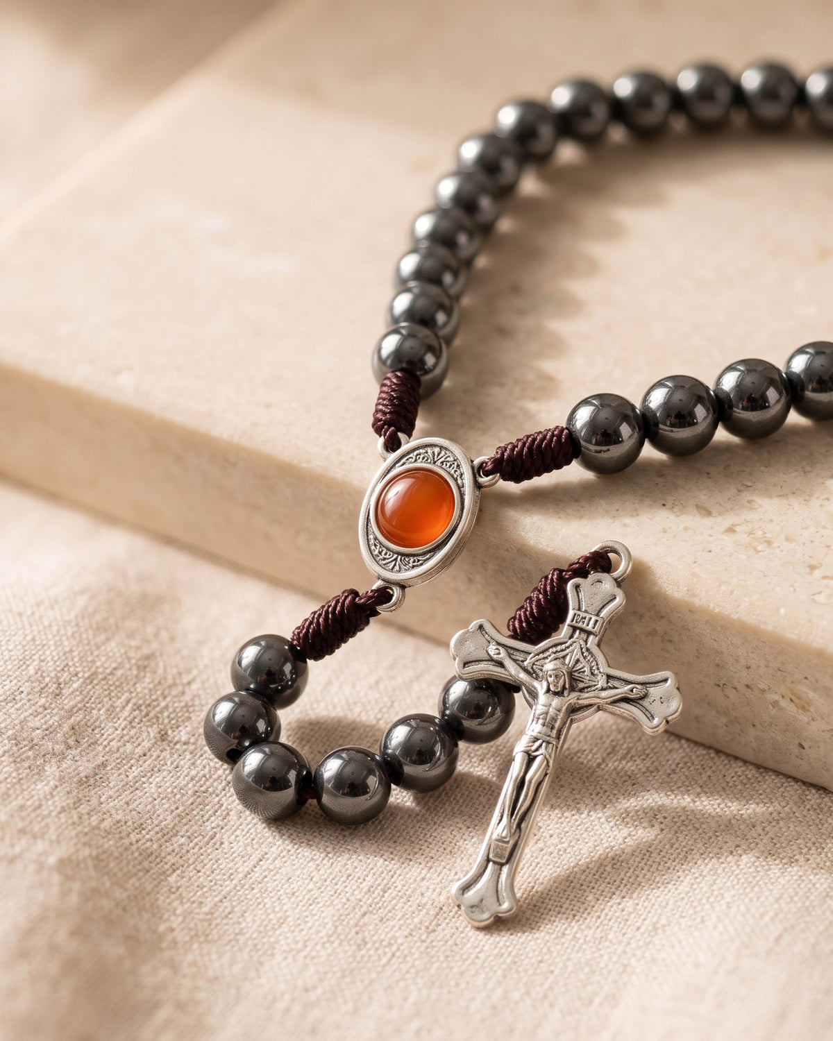 Close-up of the hematite Devout Rosary, centerpiece and crucifix [c:hematite]