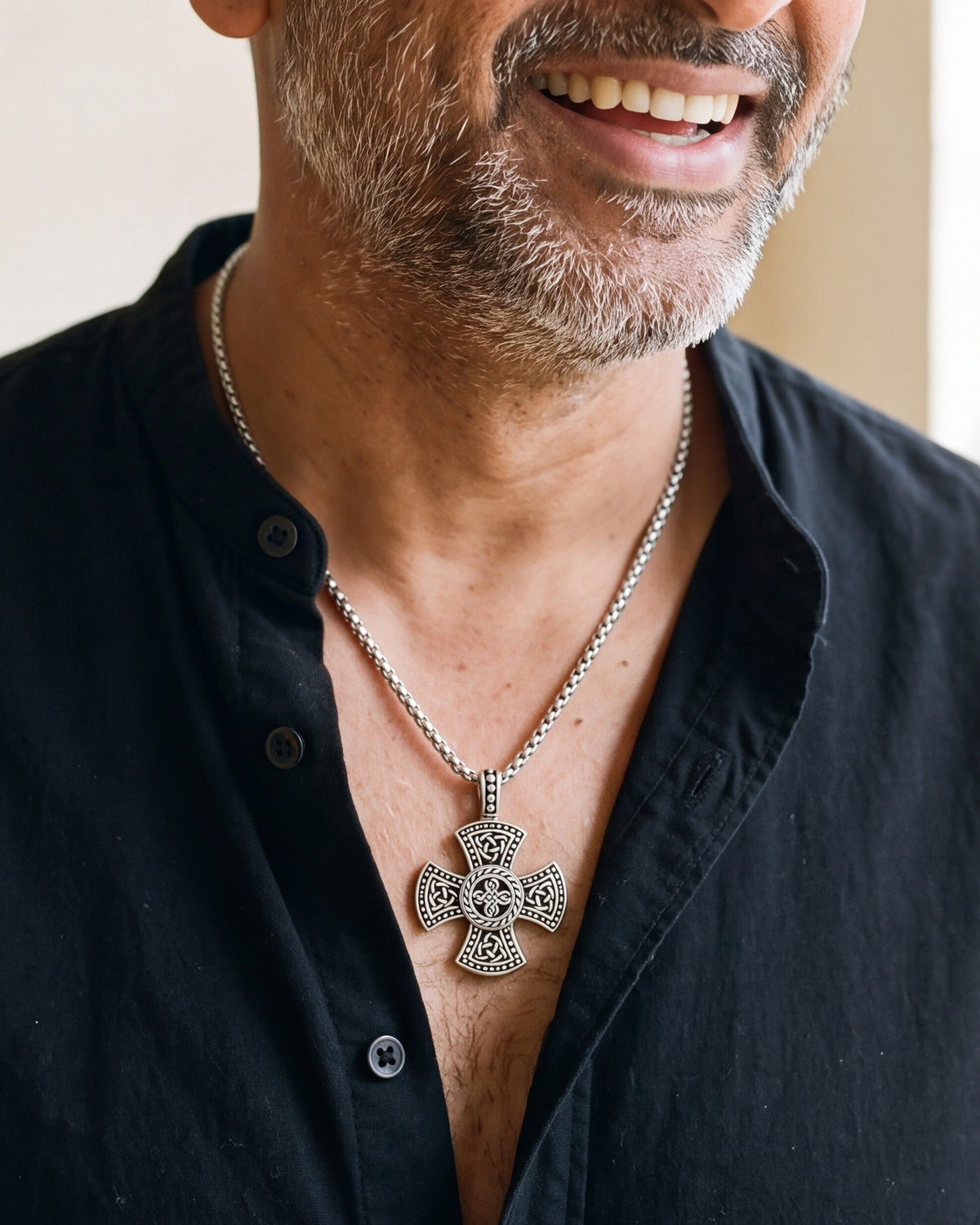 The Enduring Knot worn on the chest, close-up, true to size