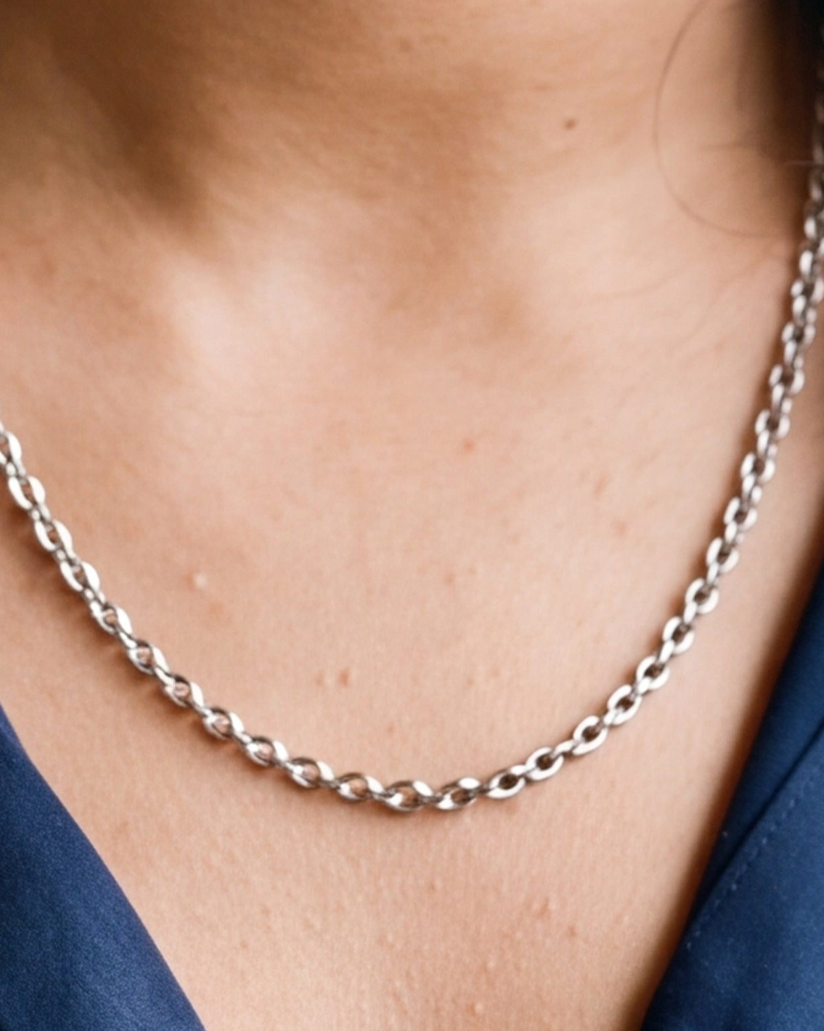 The Enduring Link worn around the neck, close-up of the links