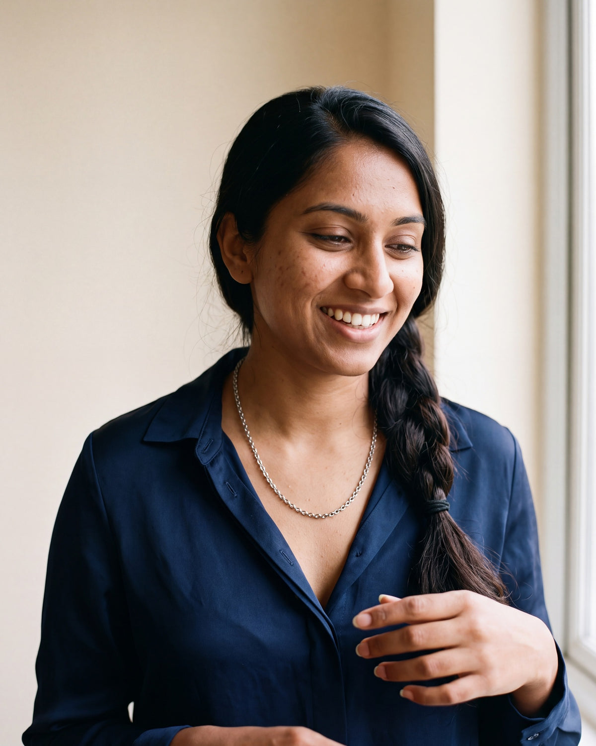 Smiling woman wearing The Enduring Link