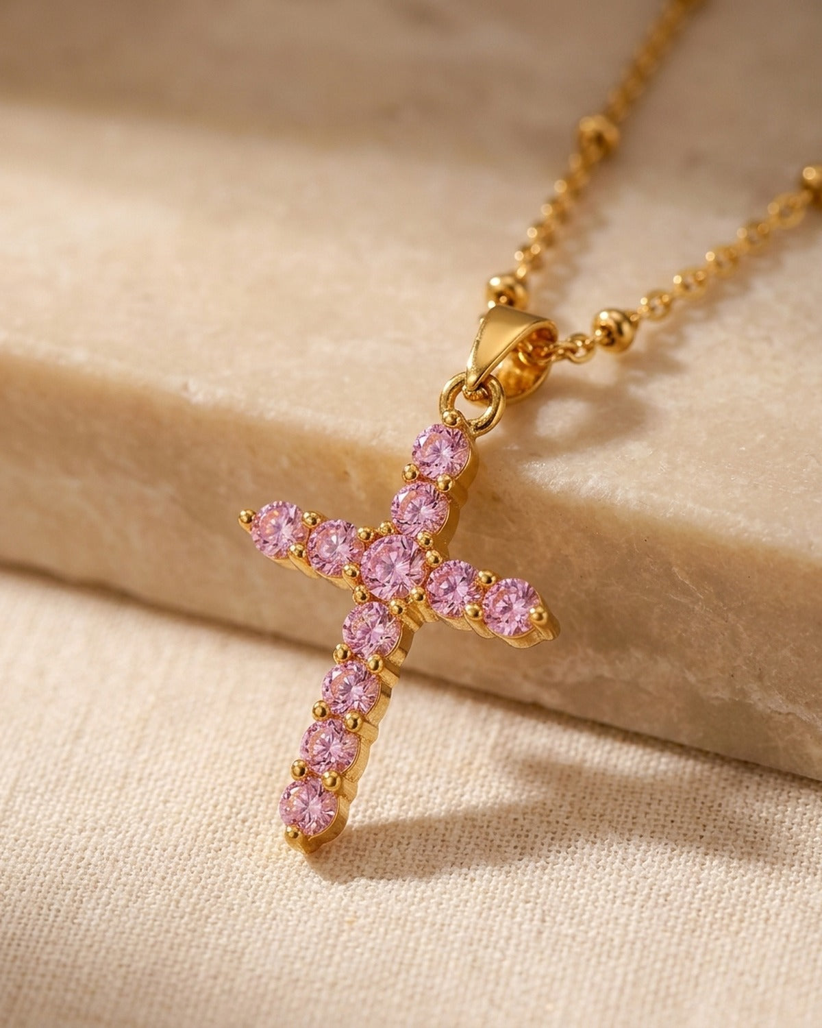 Close-up of the gold / pink Gemmed Cross [c:gold-pink]