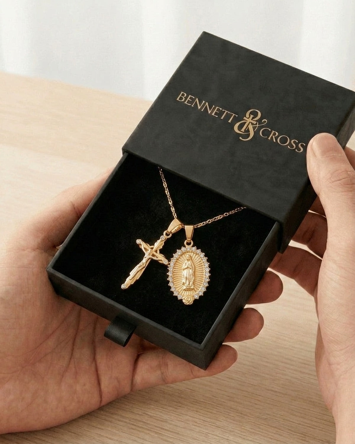 The Guadalupe Crucifix in its black Bennett & Cross gift box