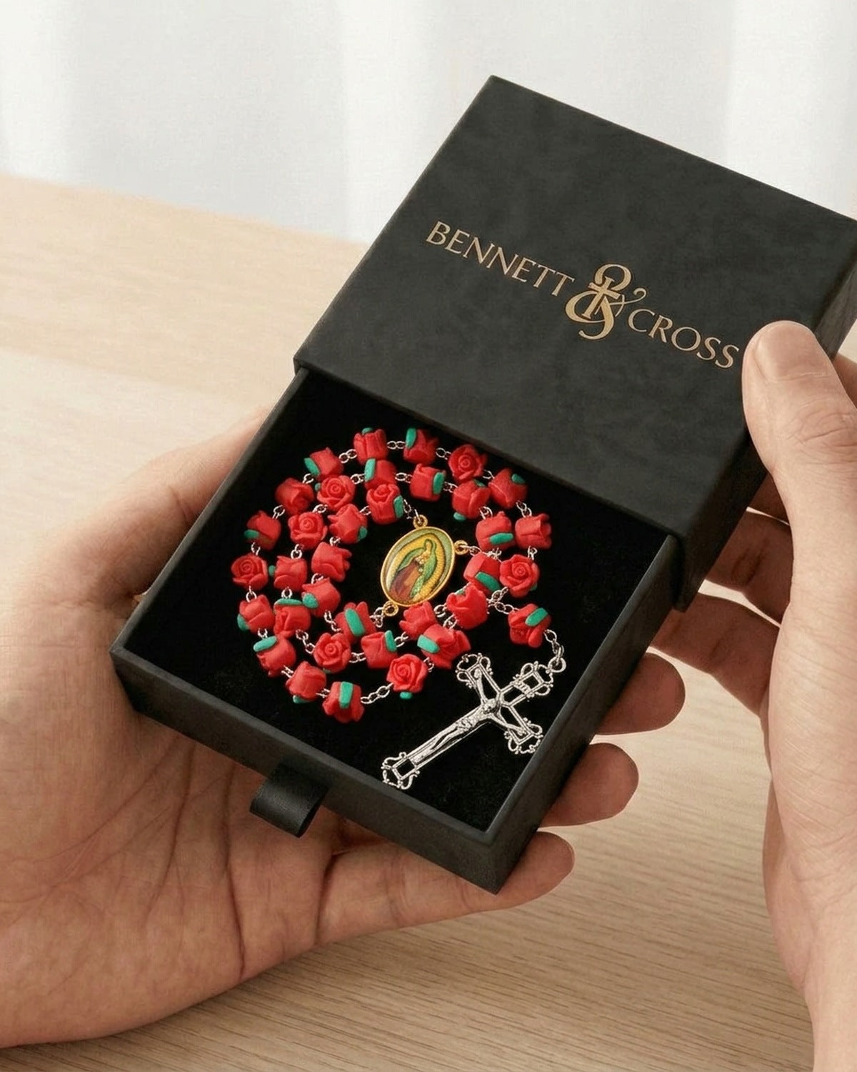 The Guadalupe Roses in its black Bennett & Cross gift box