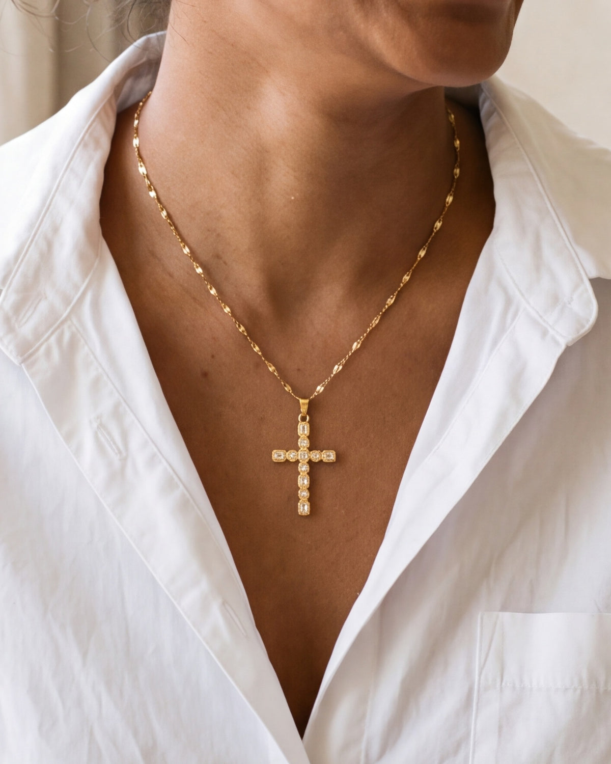The gold Jeweled Cross worn, second close-up, true to size