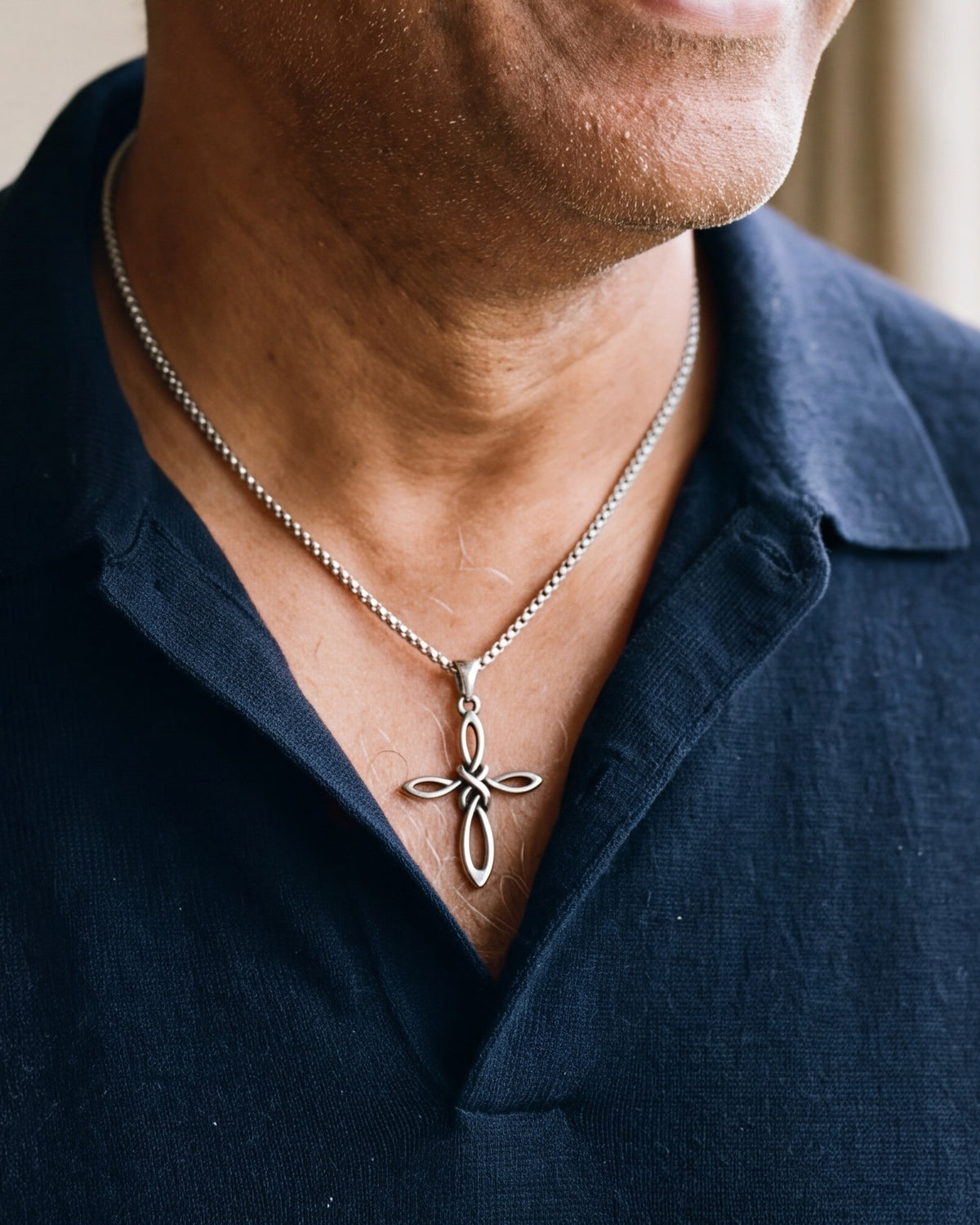 The Knotwork Cross worn, second close-up, true to size