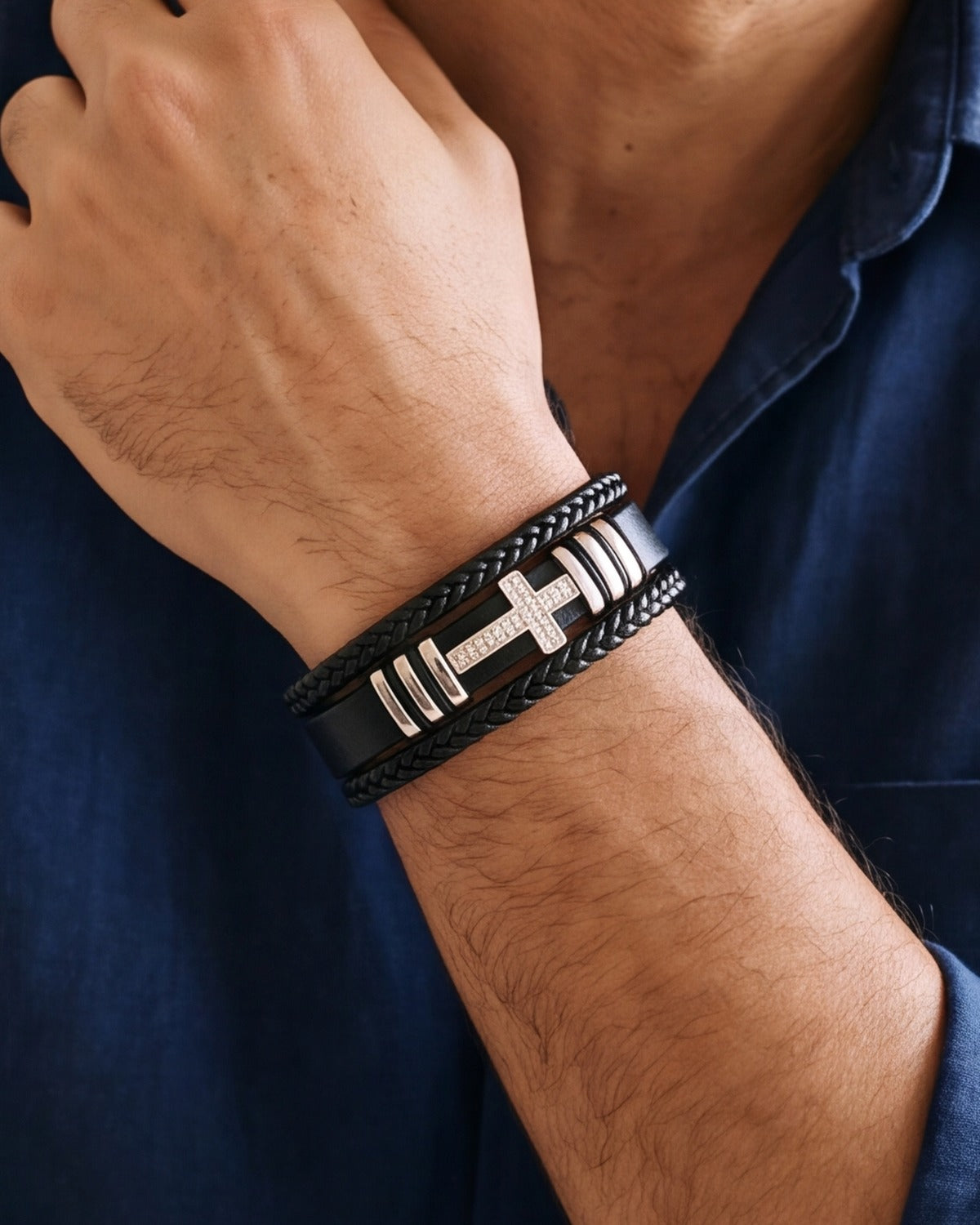 The Layered Devotion bracelet worn on a man's wrist, close-up, true to size [c:silver]