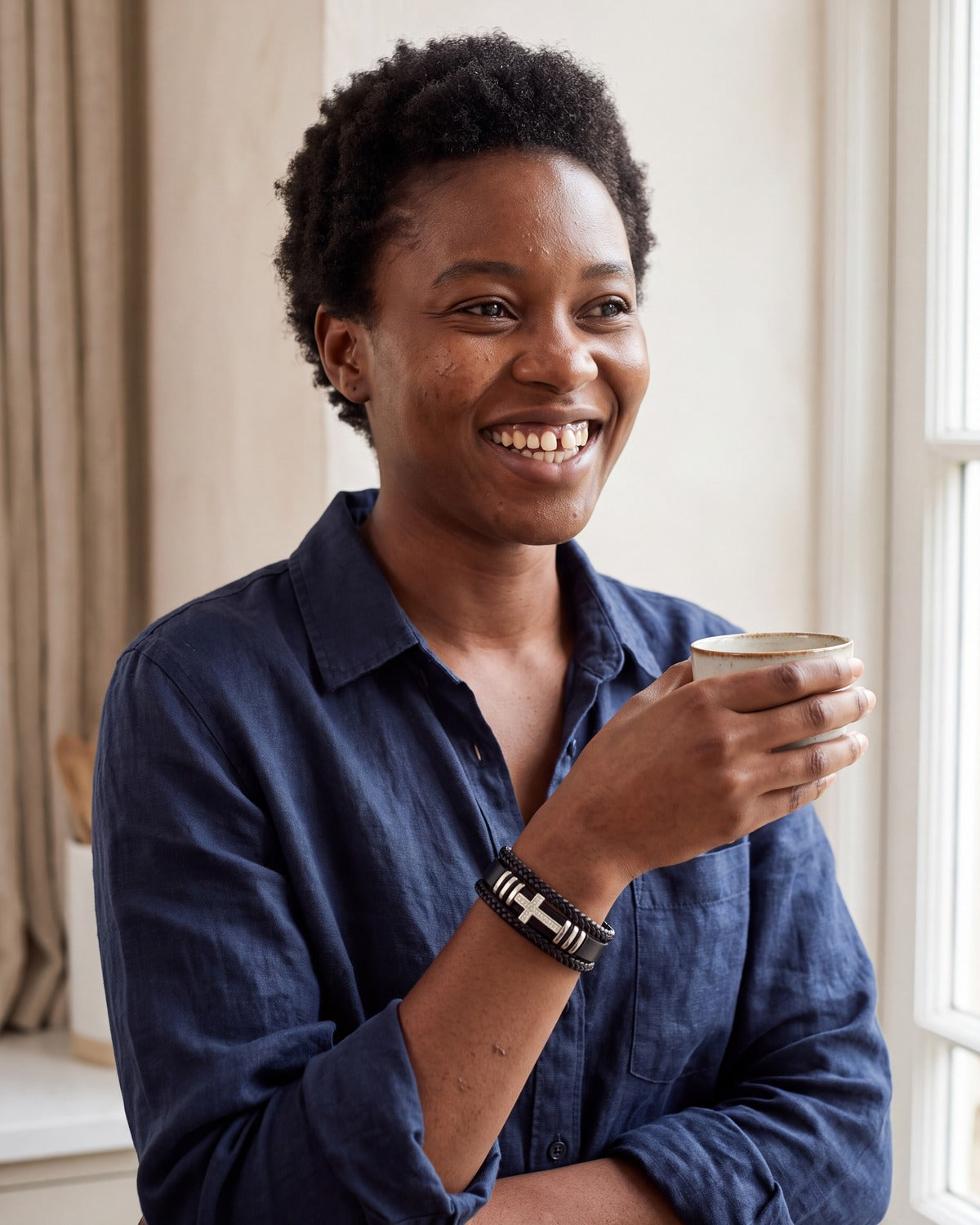 Smiling woman wearing The Layered Devotion bracelet [c:silver]