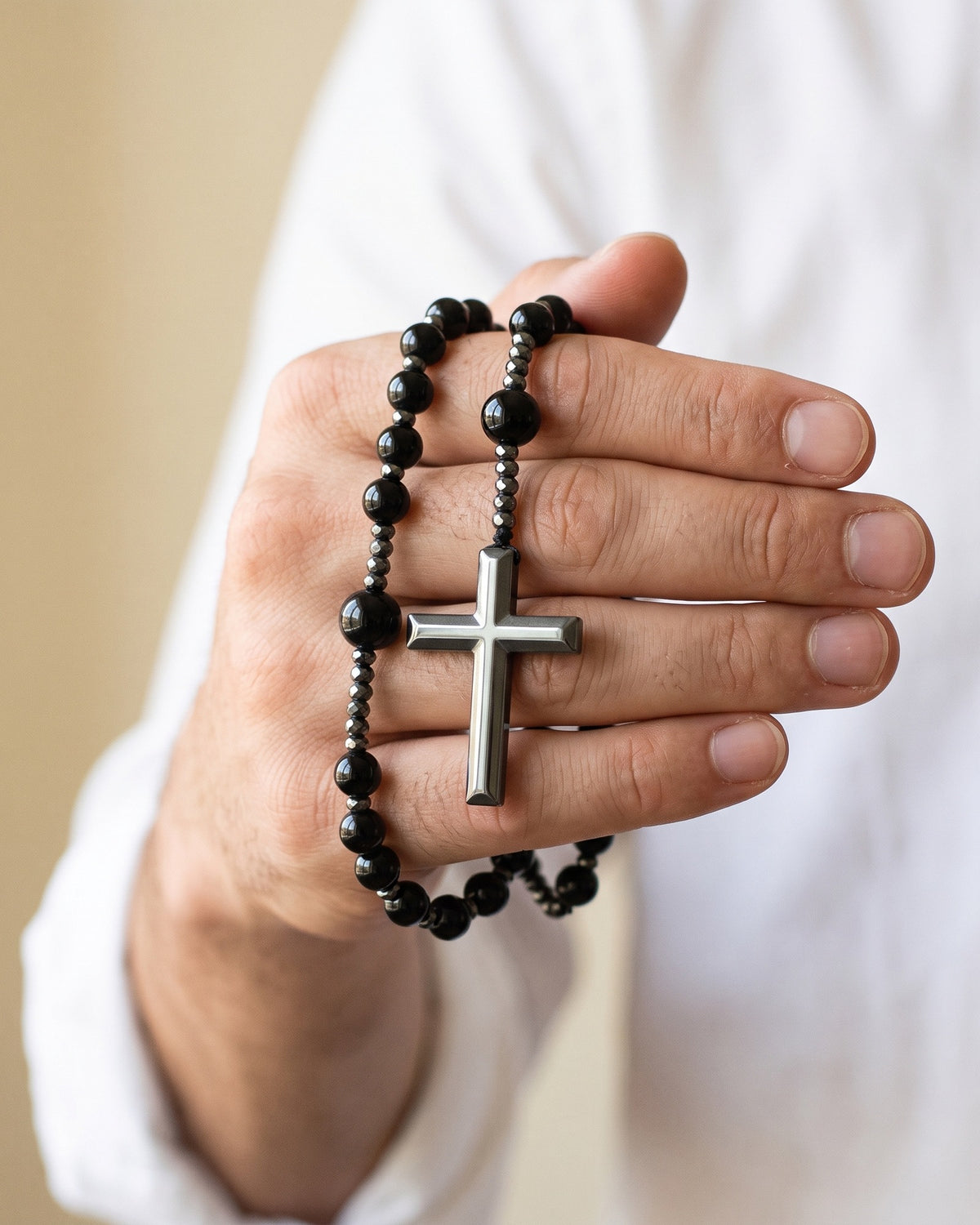 The Meditative Rosary held in the hand, true to size [c:black]