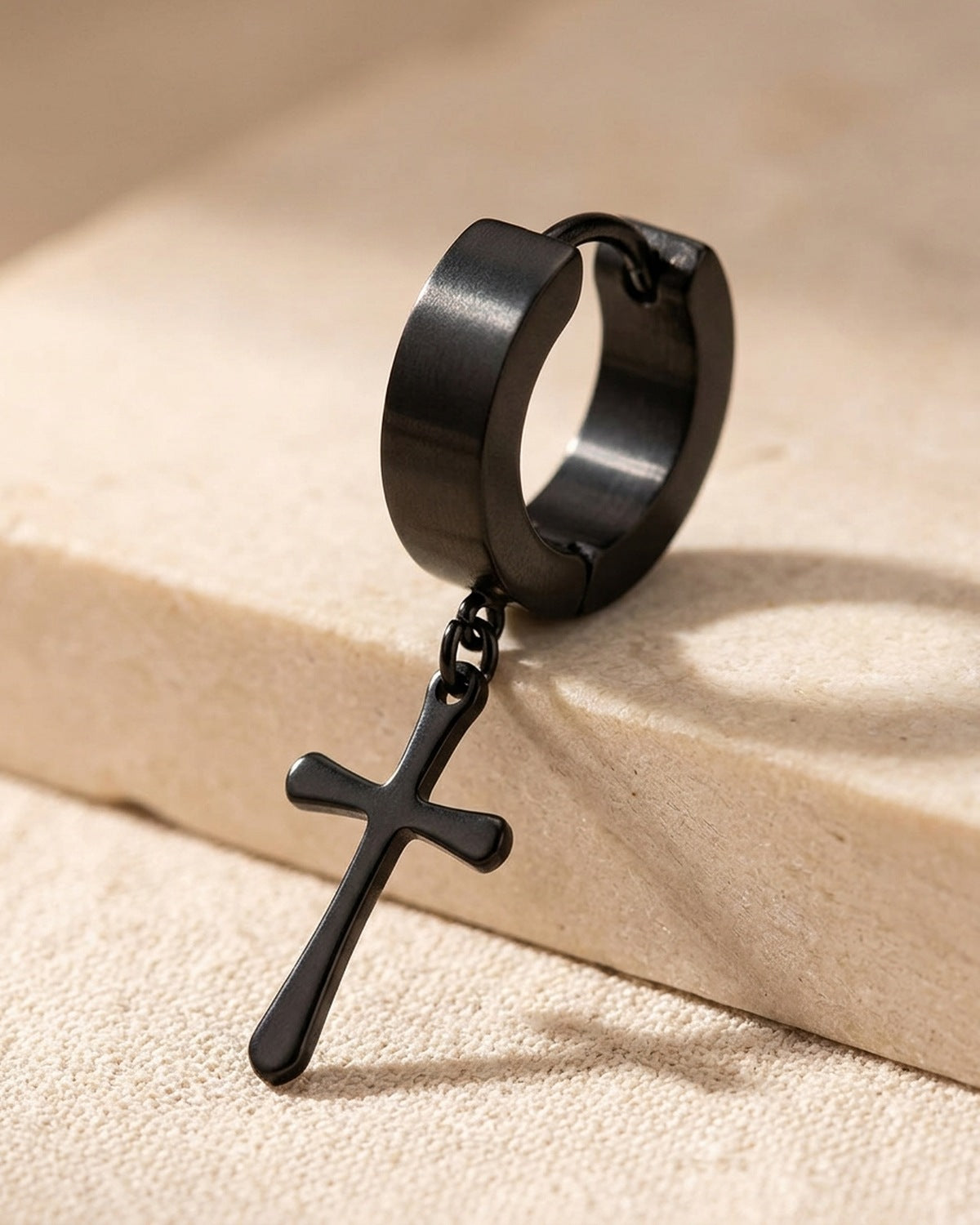 Close-up of the black Midnight Cross earring [c:black]