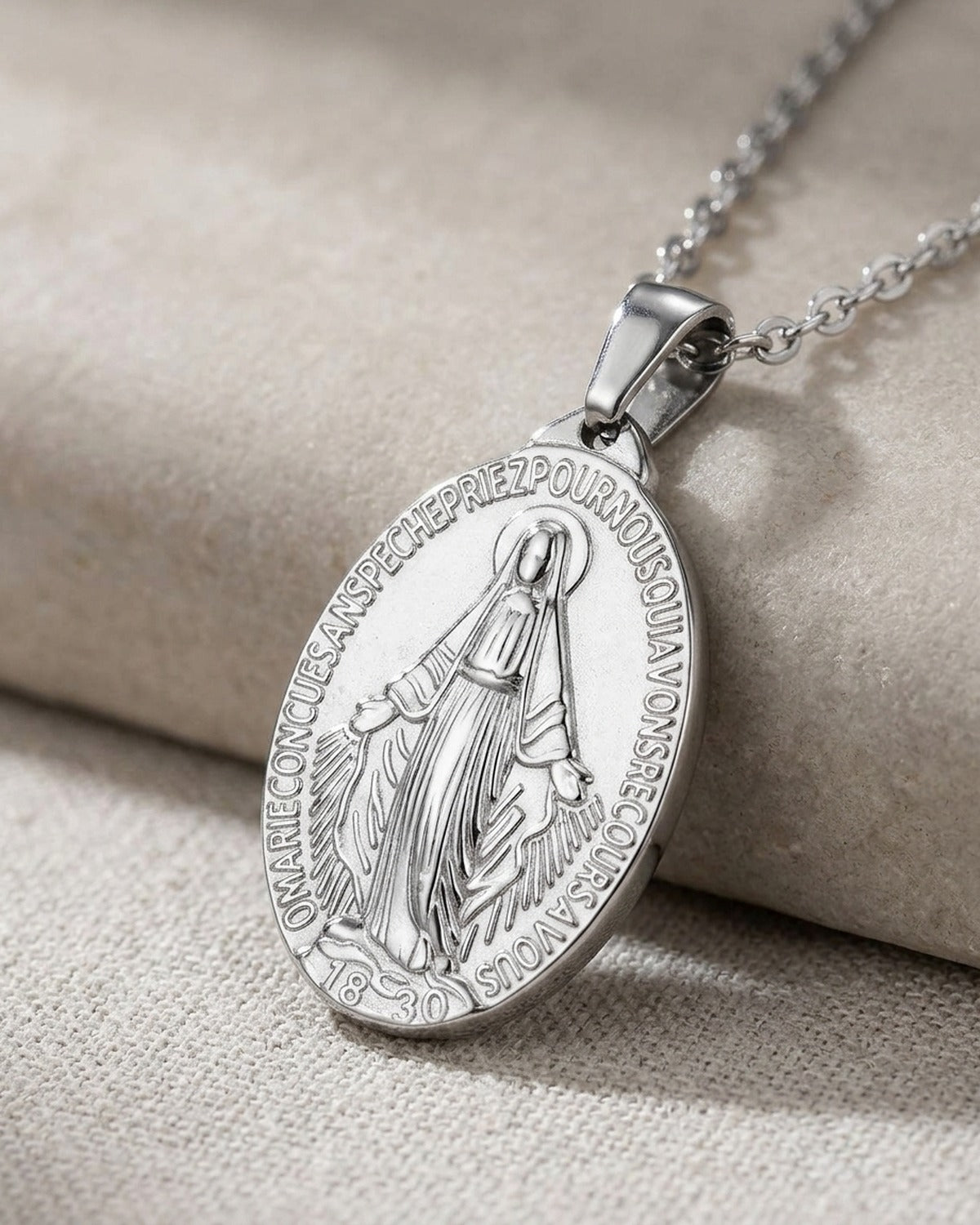 Close-up of the silver Miraculous Pendant