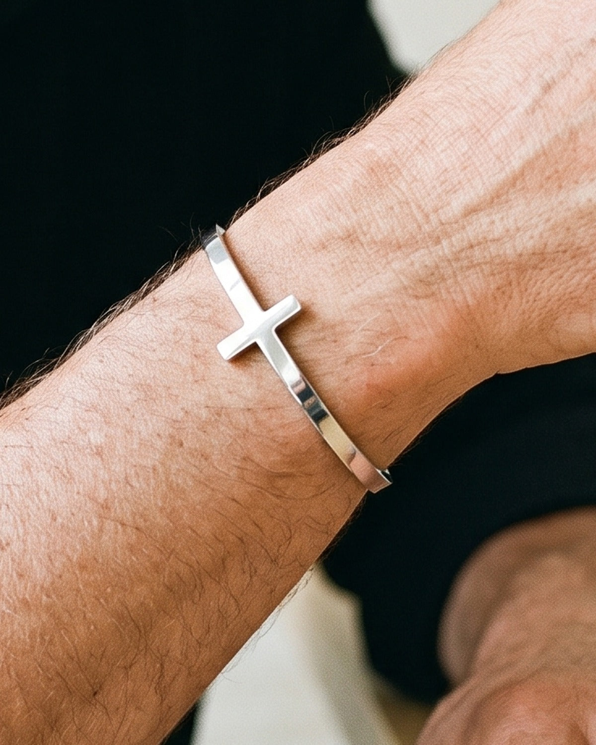 The Open Cross worn by a man, close-up, true to size [c:silver]