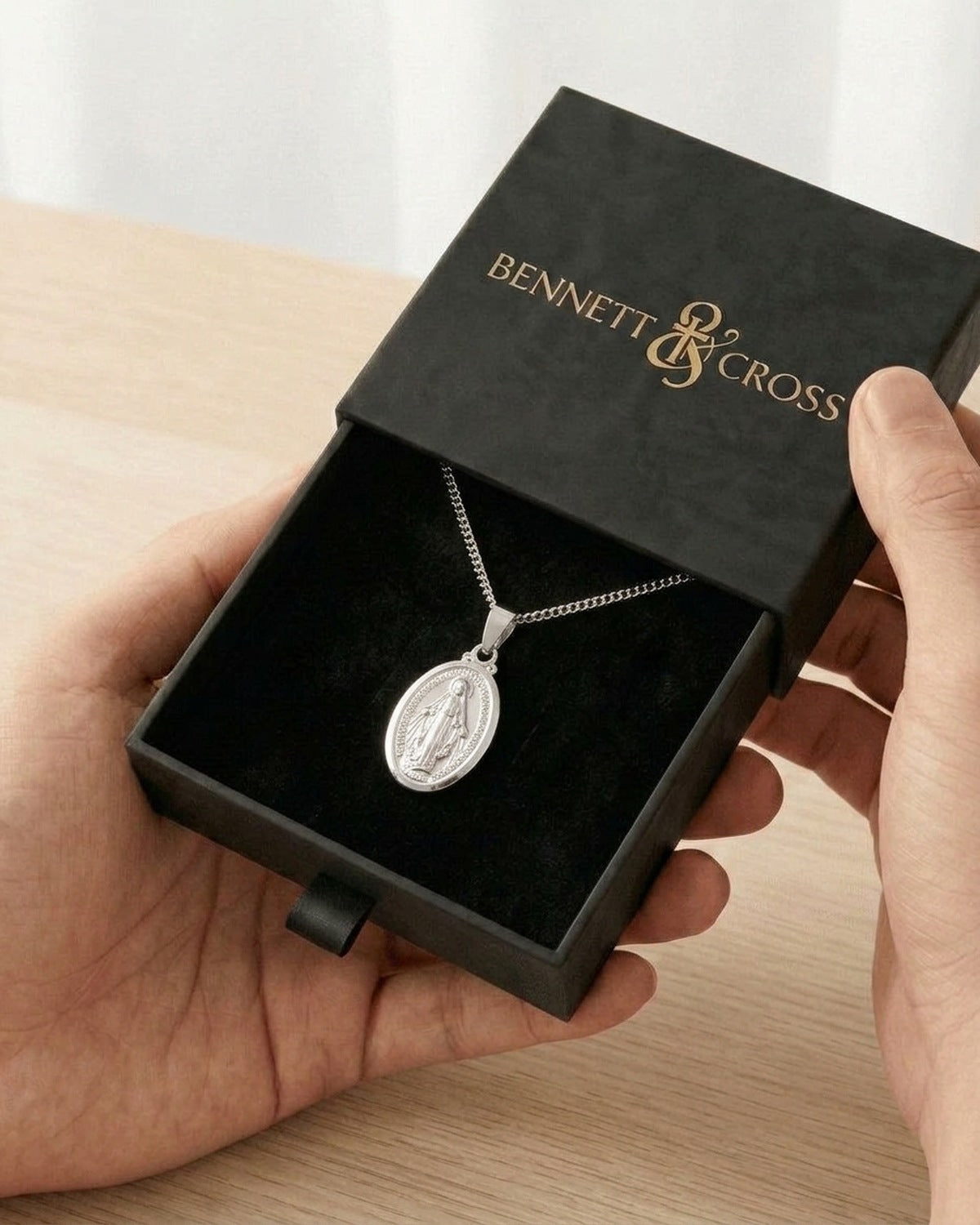 The Petite Miraculous Medal in its Bennett & Cross gift box [c:silver]