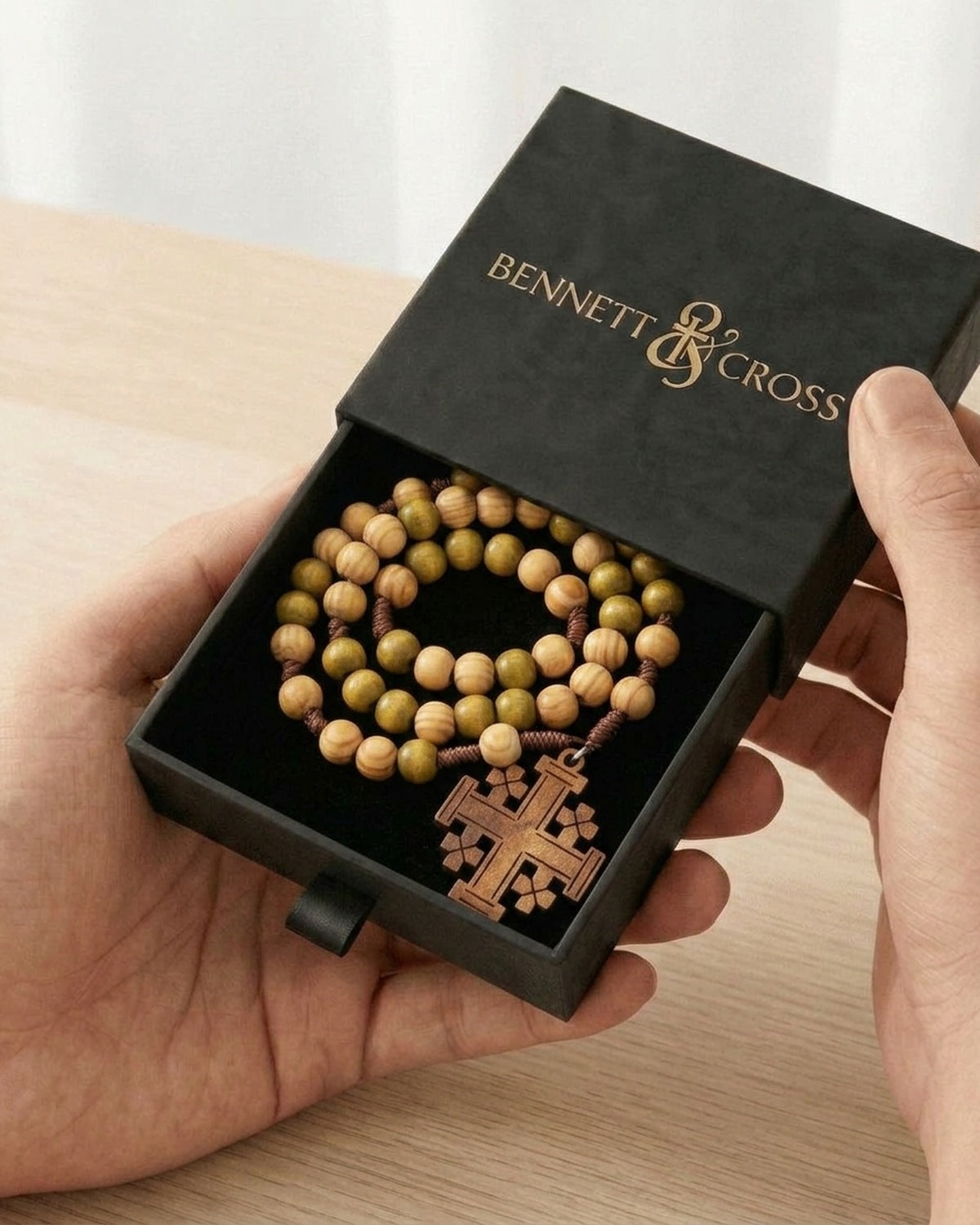 The Pilgrim's Rosary in its black Bennett & Cross gift box