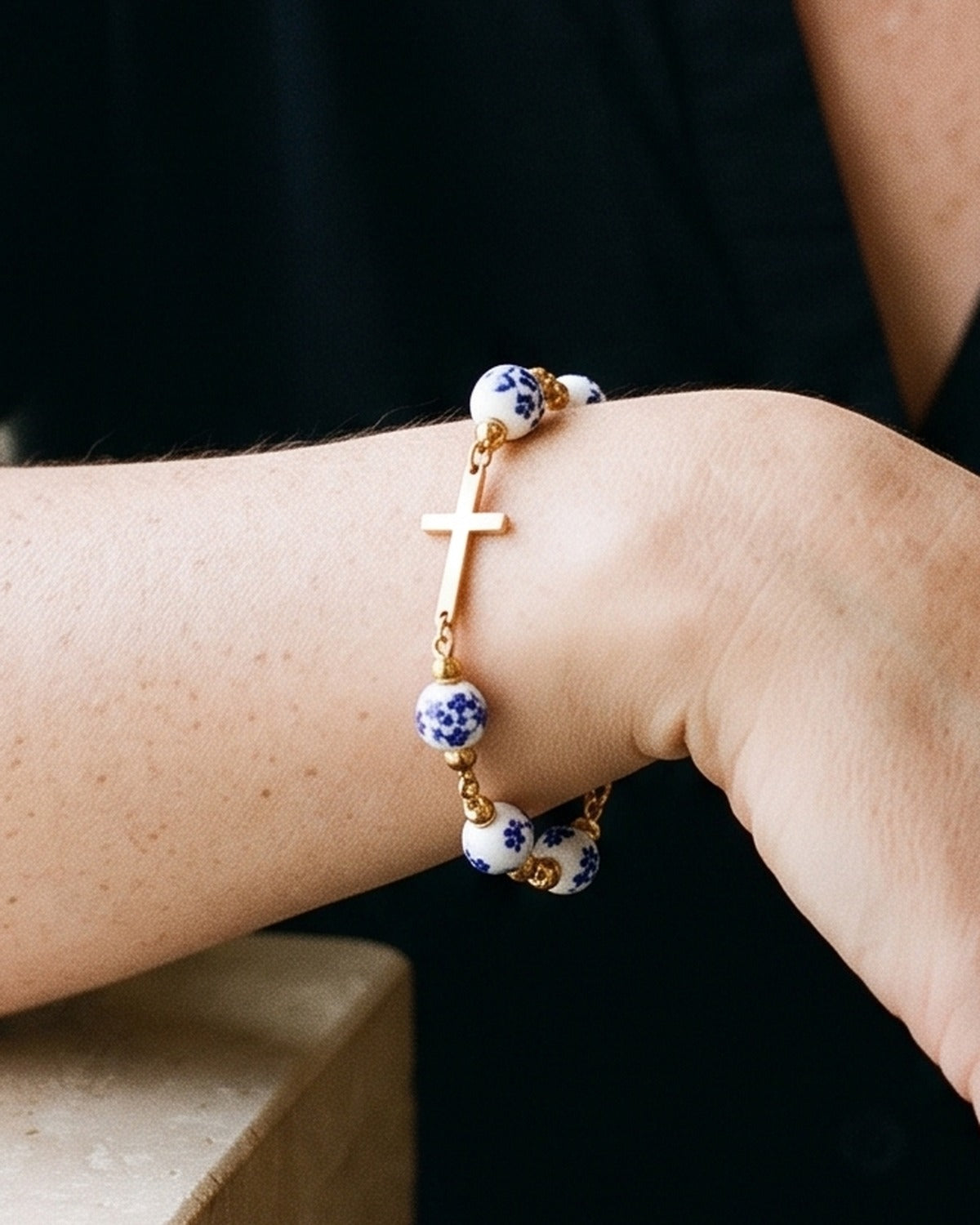 The Porcelain Grace worn by a woman, close-up, true to size [c:blue]