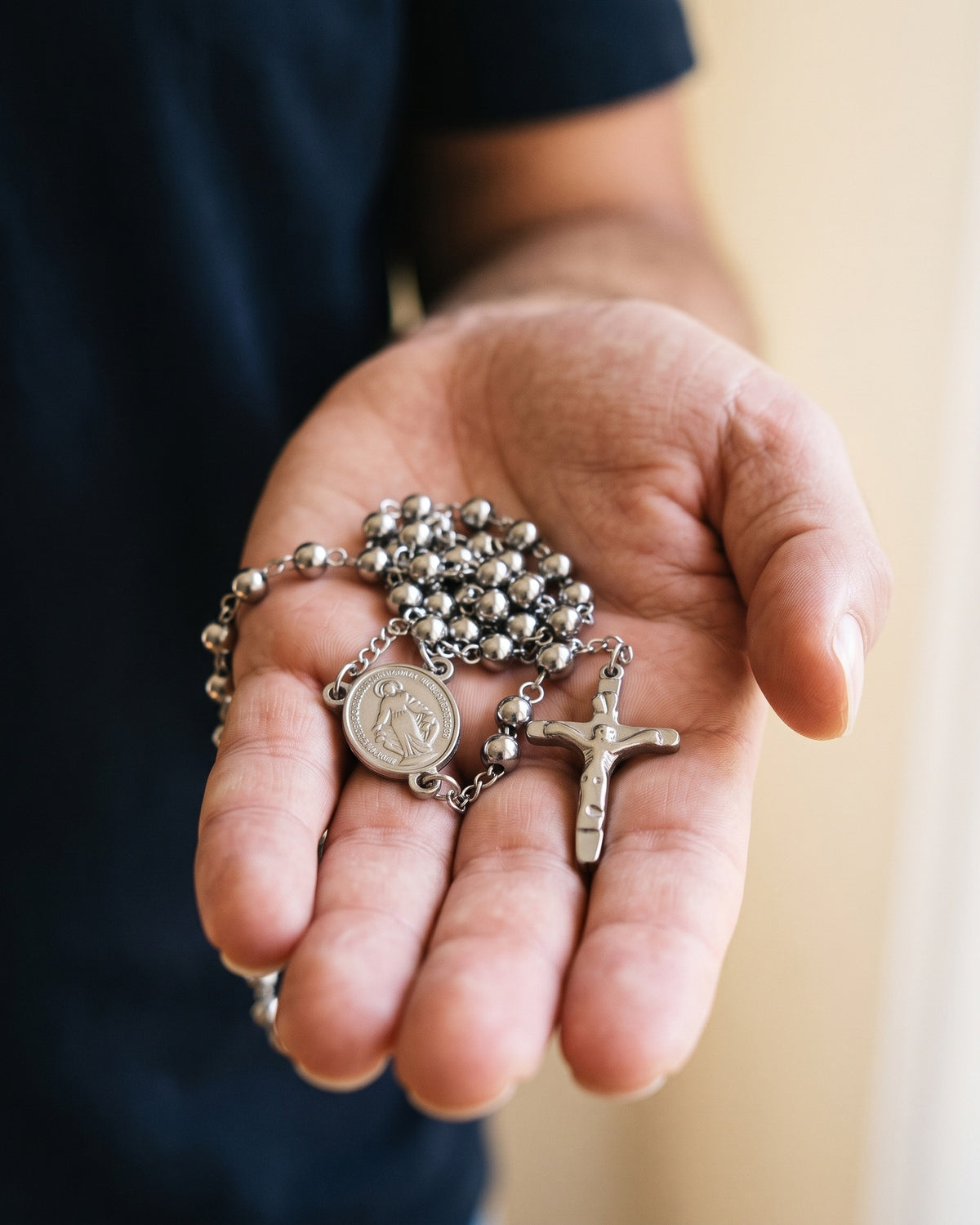 The Prayerful Journey held in the hand, true to size [c:silver]