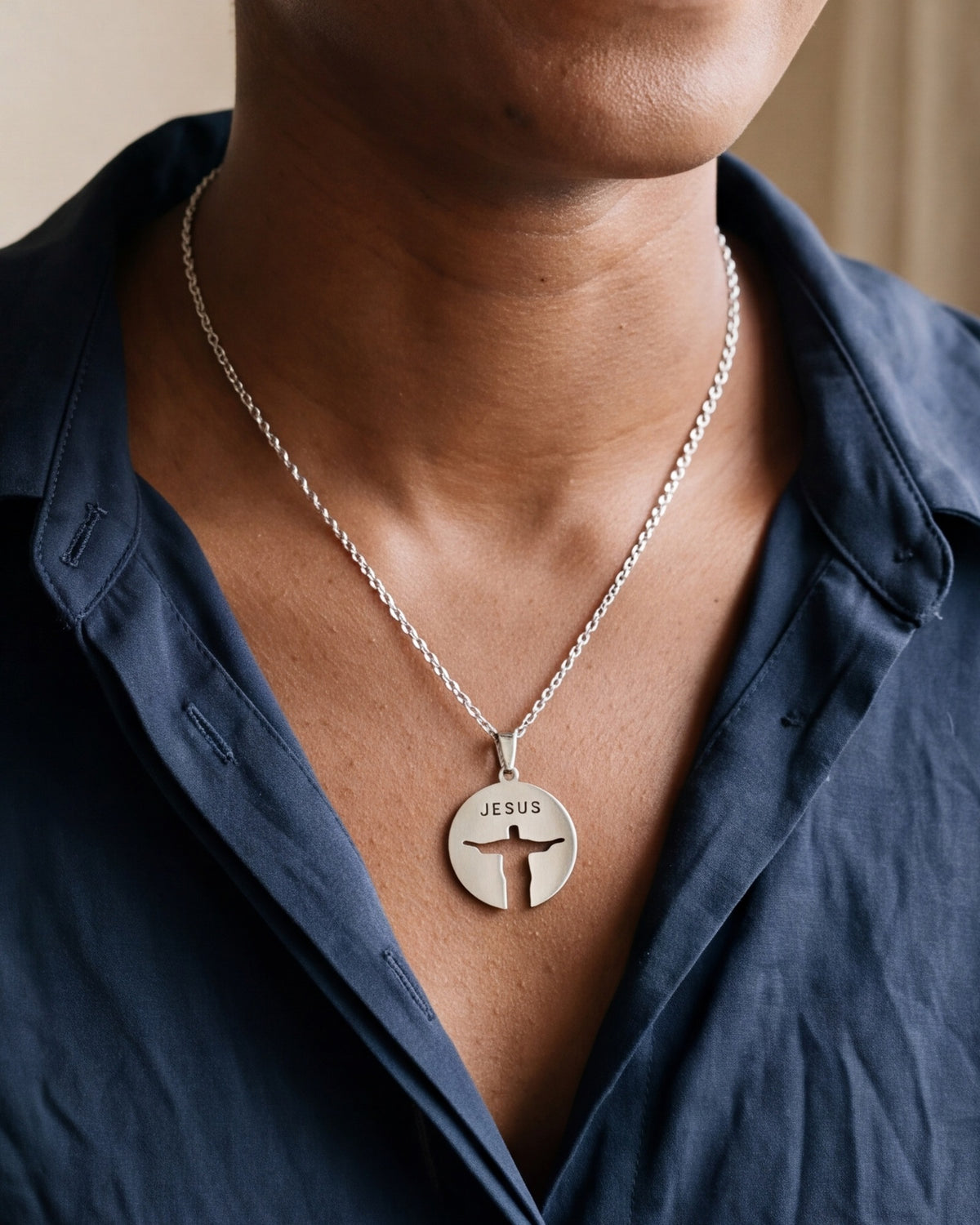 The silver Reverent Silhouette worn by a woman, close-up, true to size [c:silver]