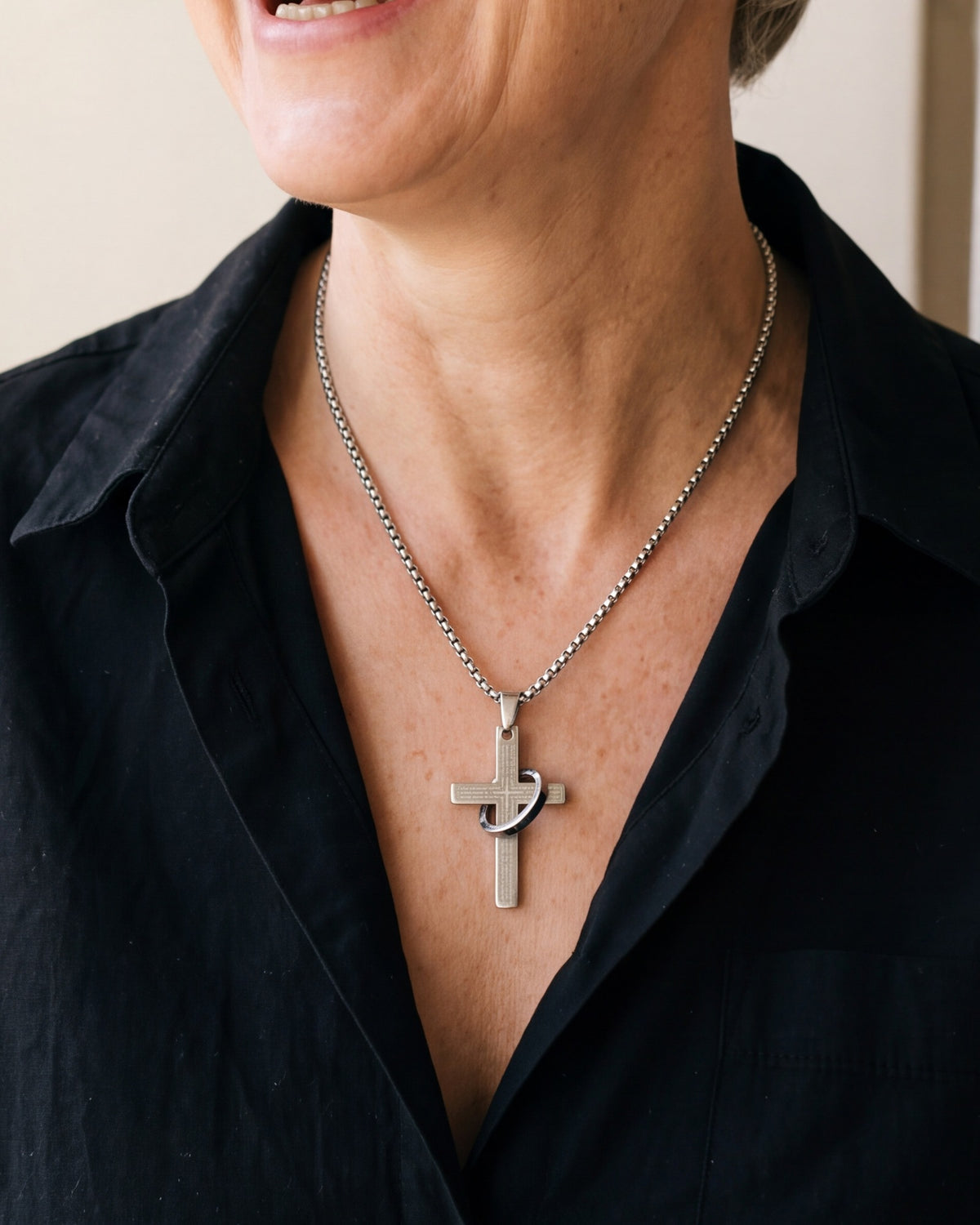 The silver Sacred Ring Cross worn by a woman, close-up, true to size [c:silver]