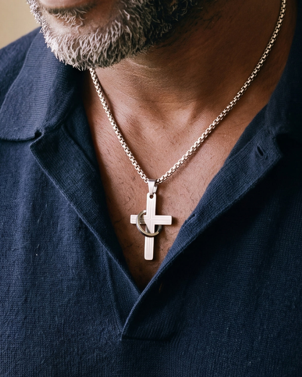 The silver Sacred Ring Cross worn by a man, second close-up, true to size [c:silver]