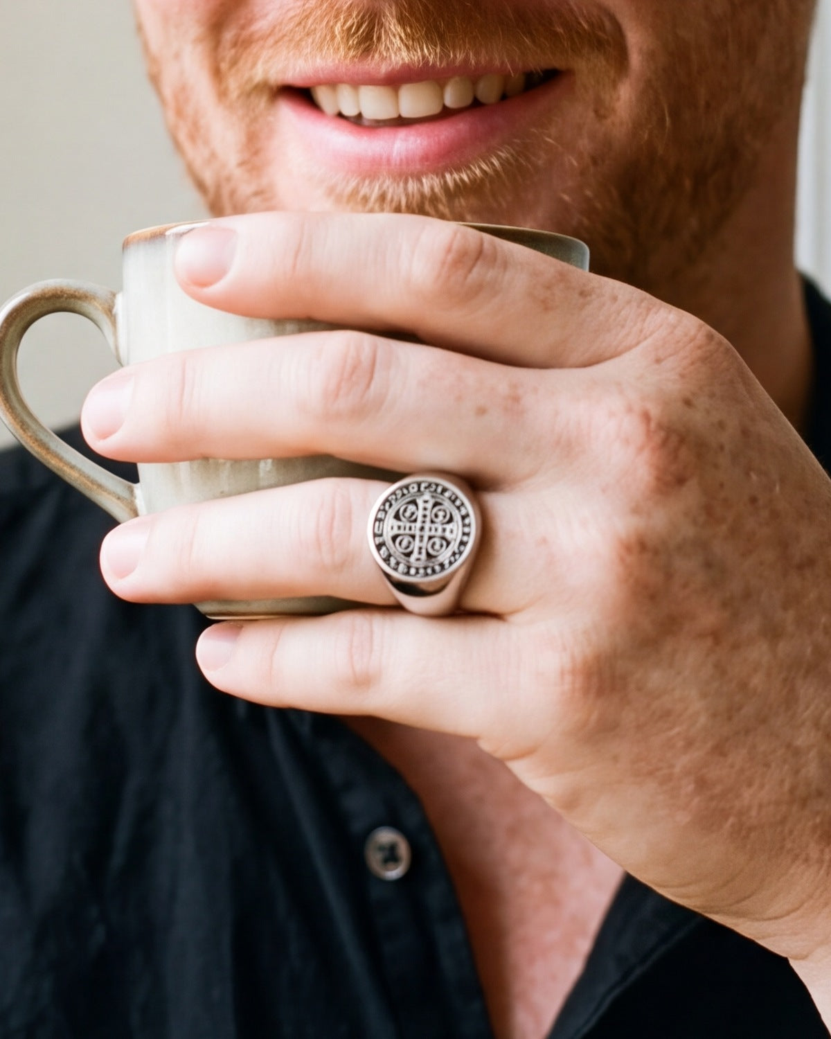 The silver Sacred Signet worn by a man, close-up on the hand, true to size [c:silver]