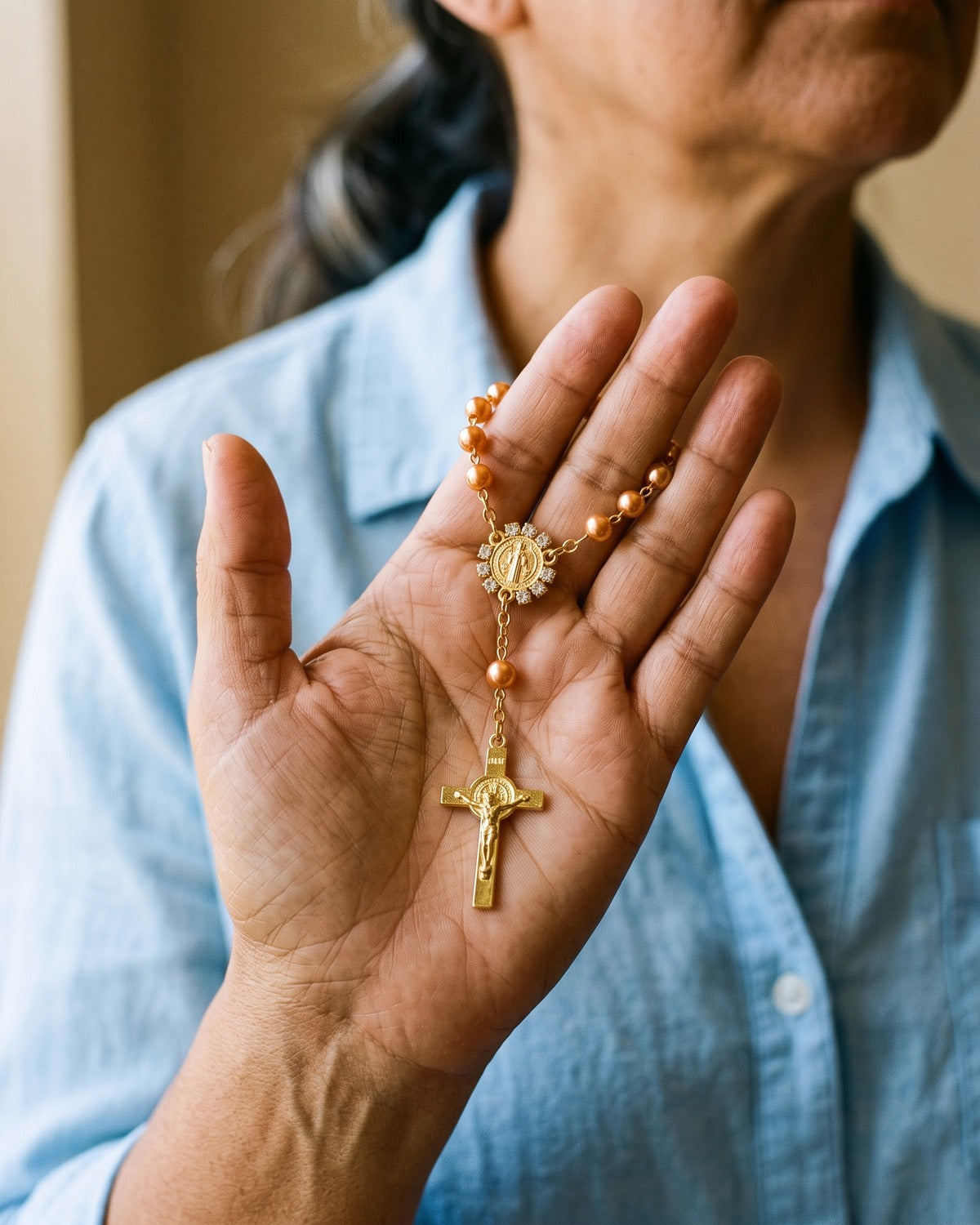 The Saint Benedict Decade in the palm of a hand, true to size [c:orange]