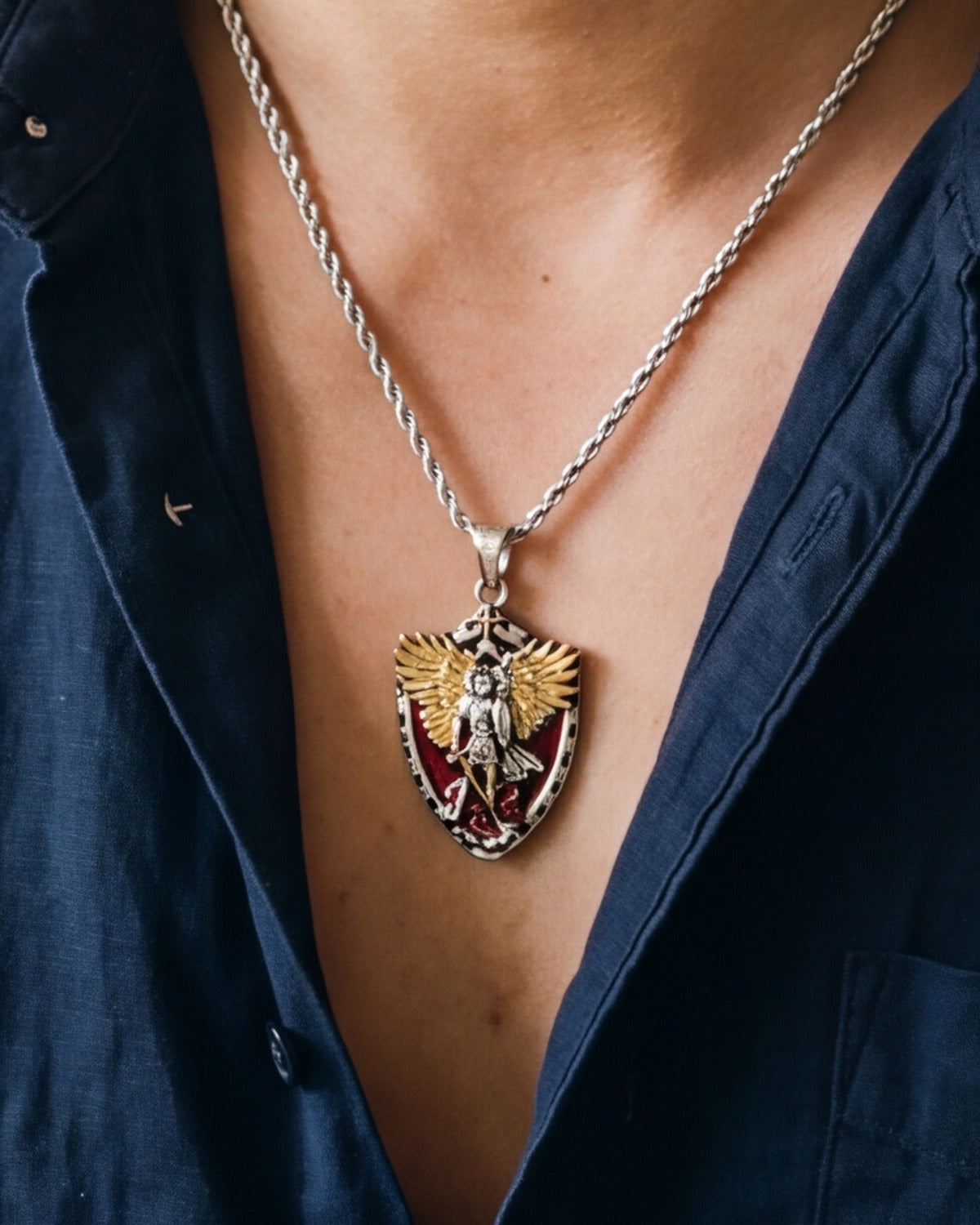The antique silver Saint Michael Crest worn, close-up, true to size [c:antique-silver]