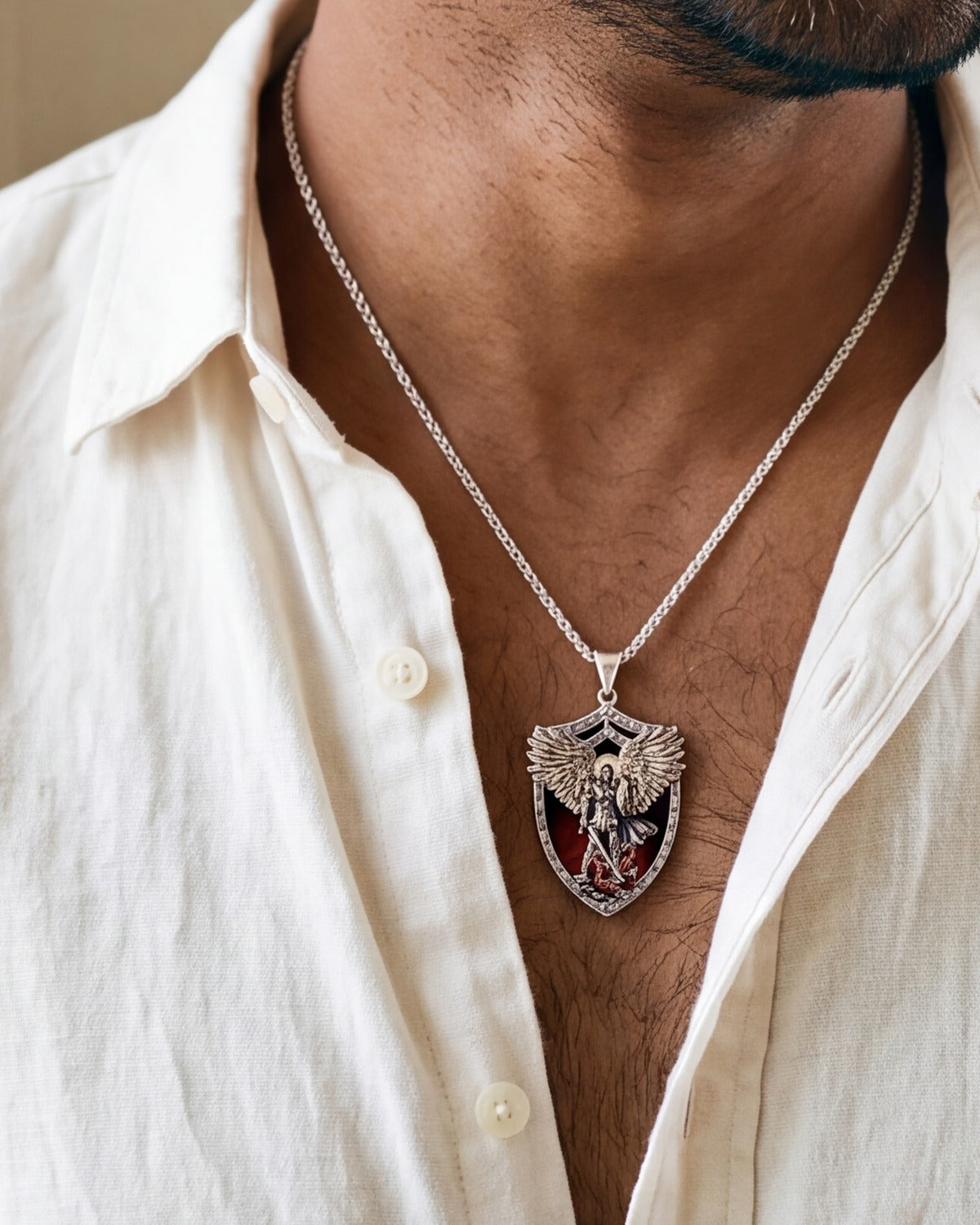 The Saint Michael Shield pendant worn, second close-up, true to size