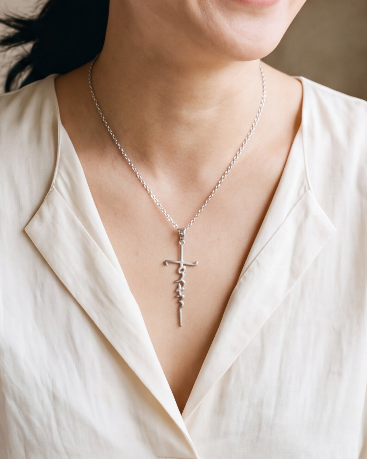 The Scripted Cross worn, second close-up, true to size [c:silver]
