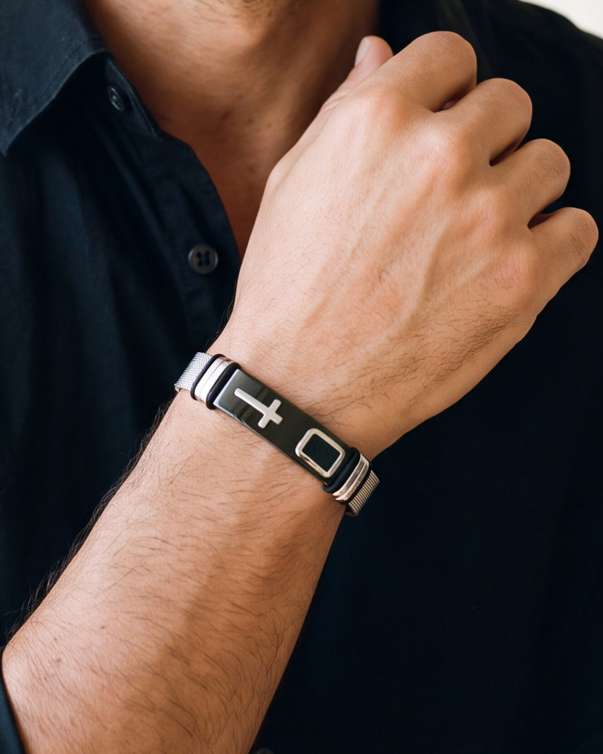 The Shadowed Cross bracelet on the wrist, close-up, true to size [c:black-silver]