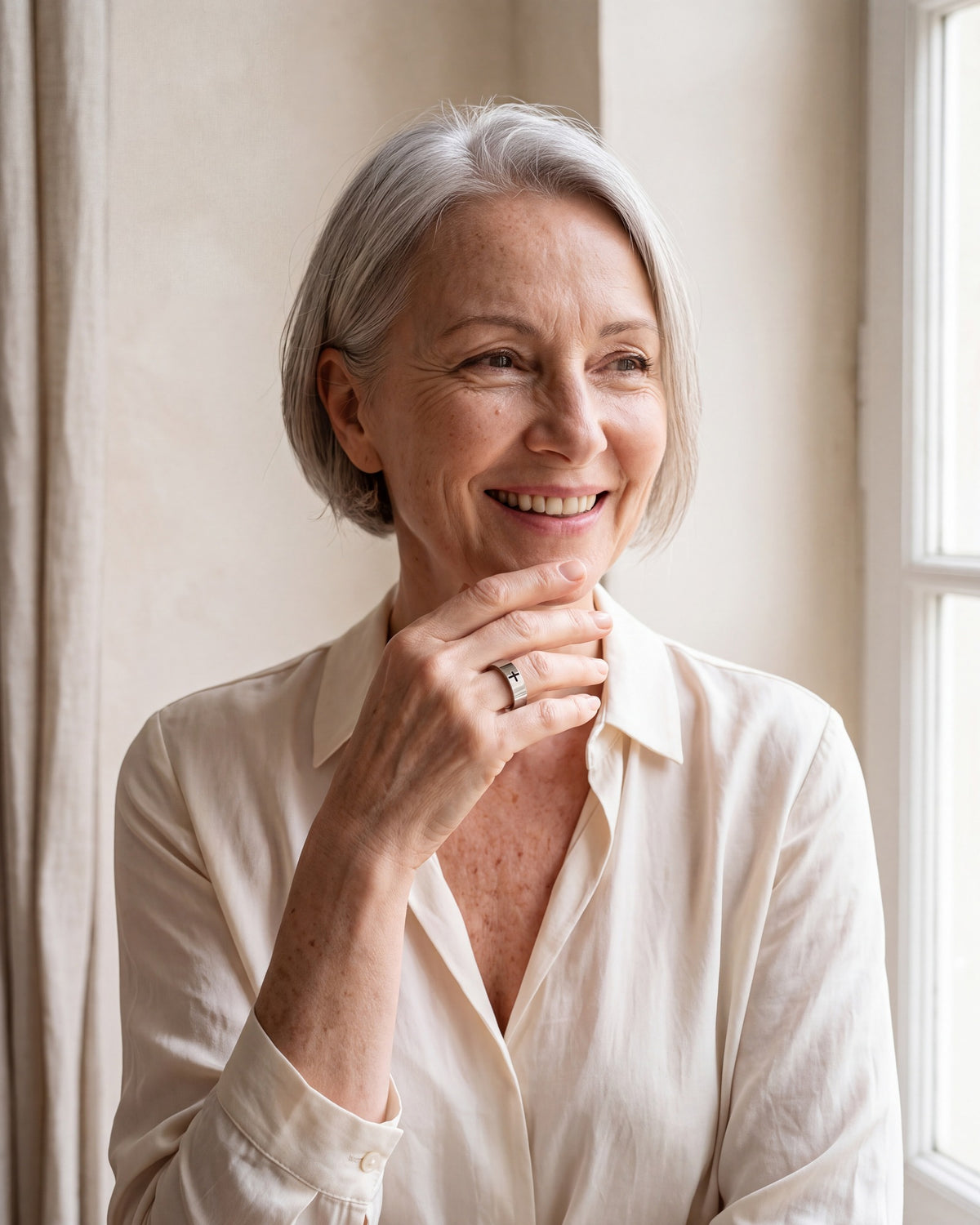 Smiling woman wearing The Steadfast Bond