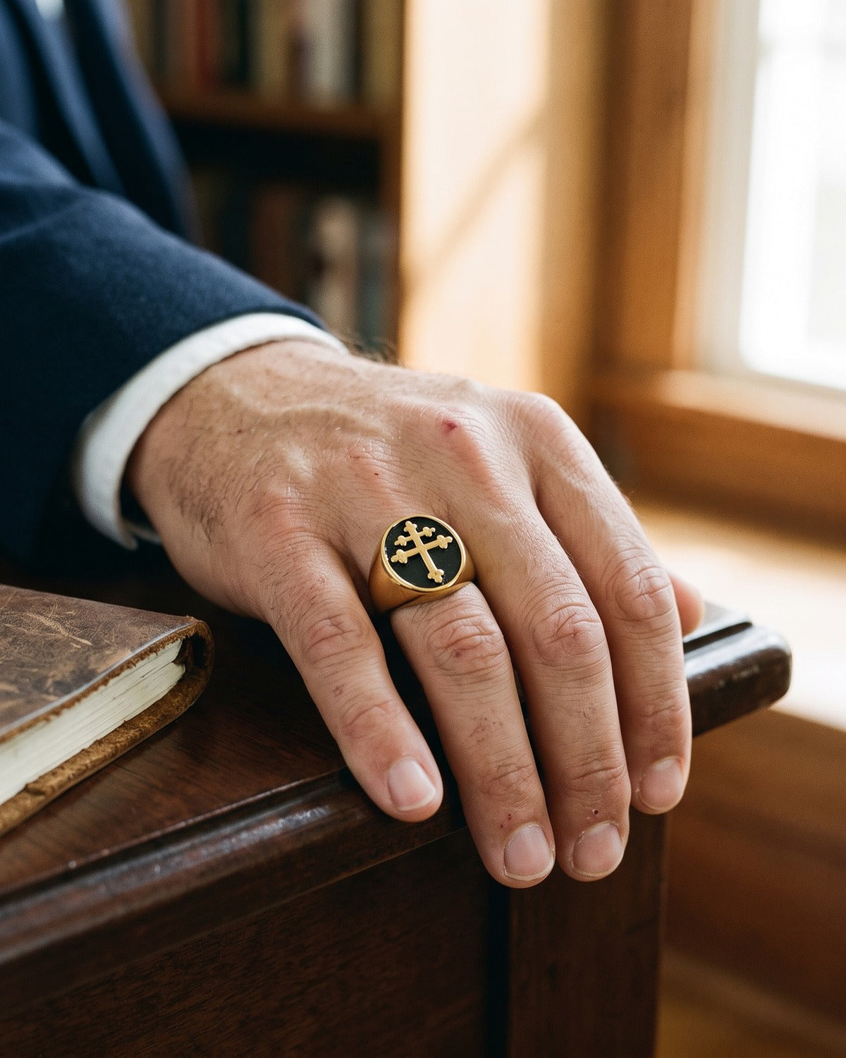 Man wearing the gold Steadfast Signet