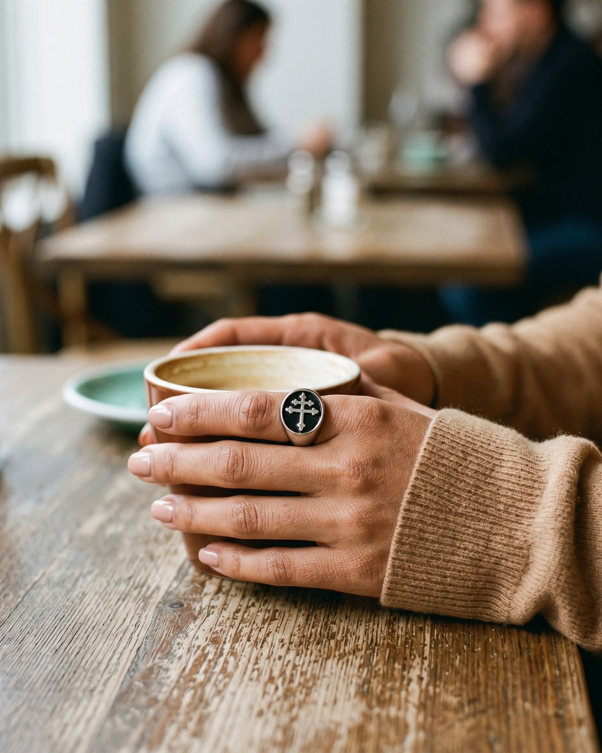 Woman wearing the silver Steadfast Signet