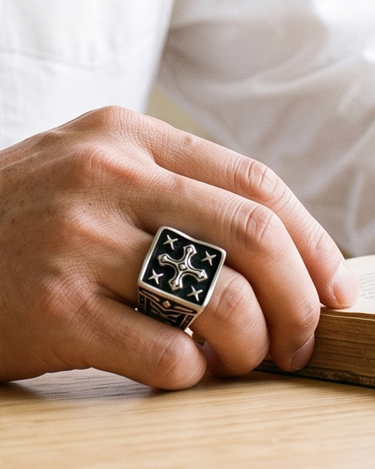 The Templar Signet on a man's finger, close-up, true to size